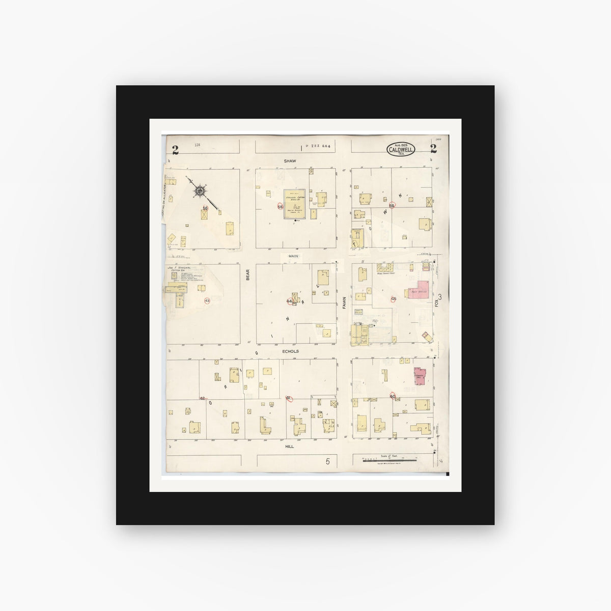 Old map wall art mockup — black gallery frame with white mat — Sanborn Fire Insurance Map from Caldwell, Burleson County, Texas (1943), Sheet #0002