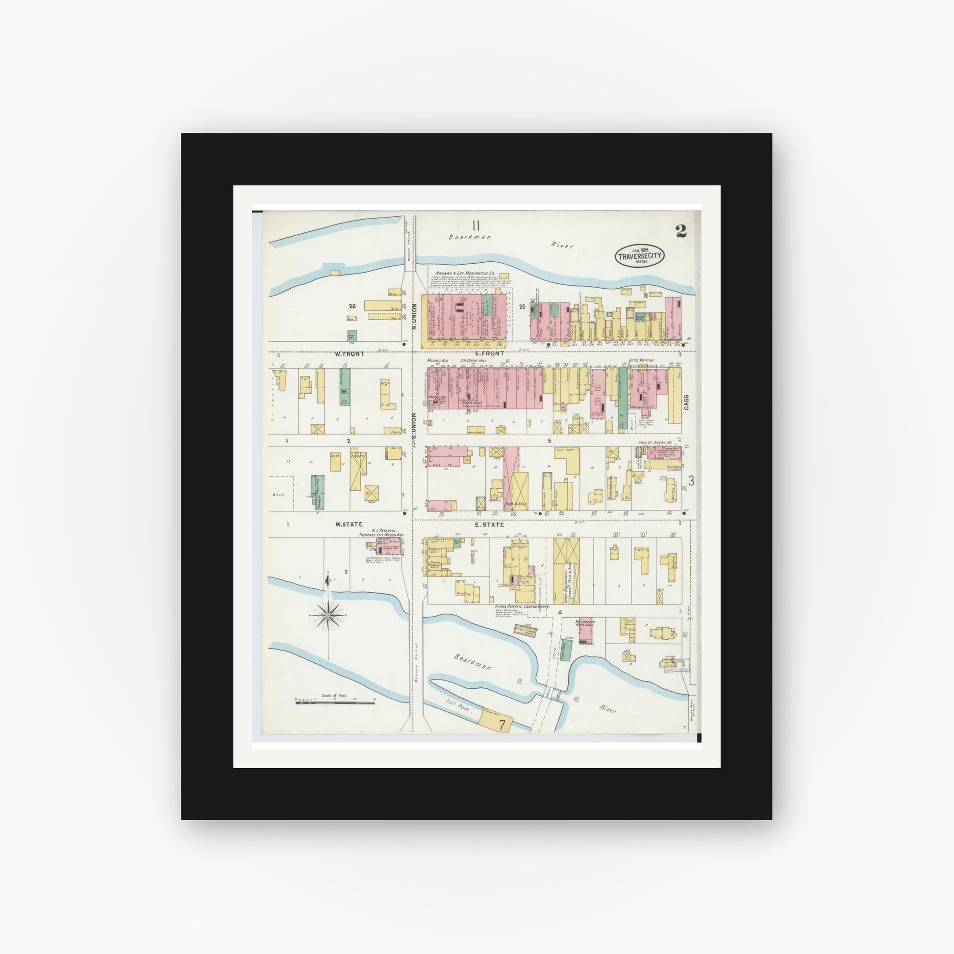 Old map wall art mockup — black gallery frame with white mat — Sanborn Fire Insurance Map from Traverse City, Grand Traverse County, Michigan (1899), Sheet #0002