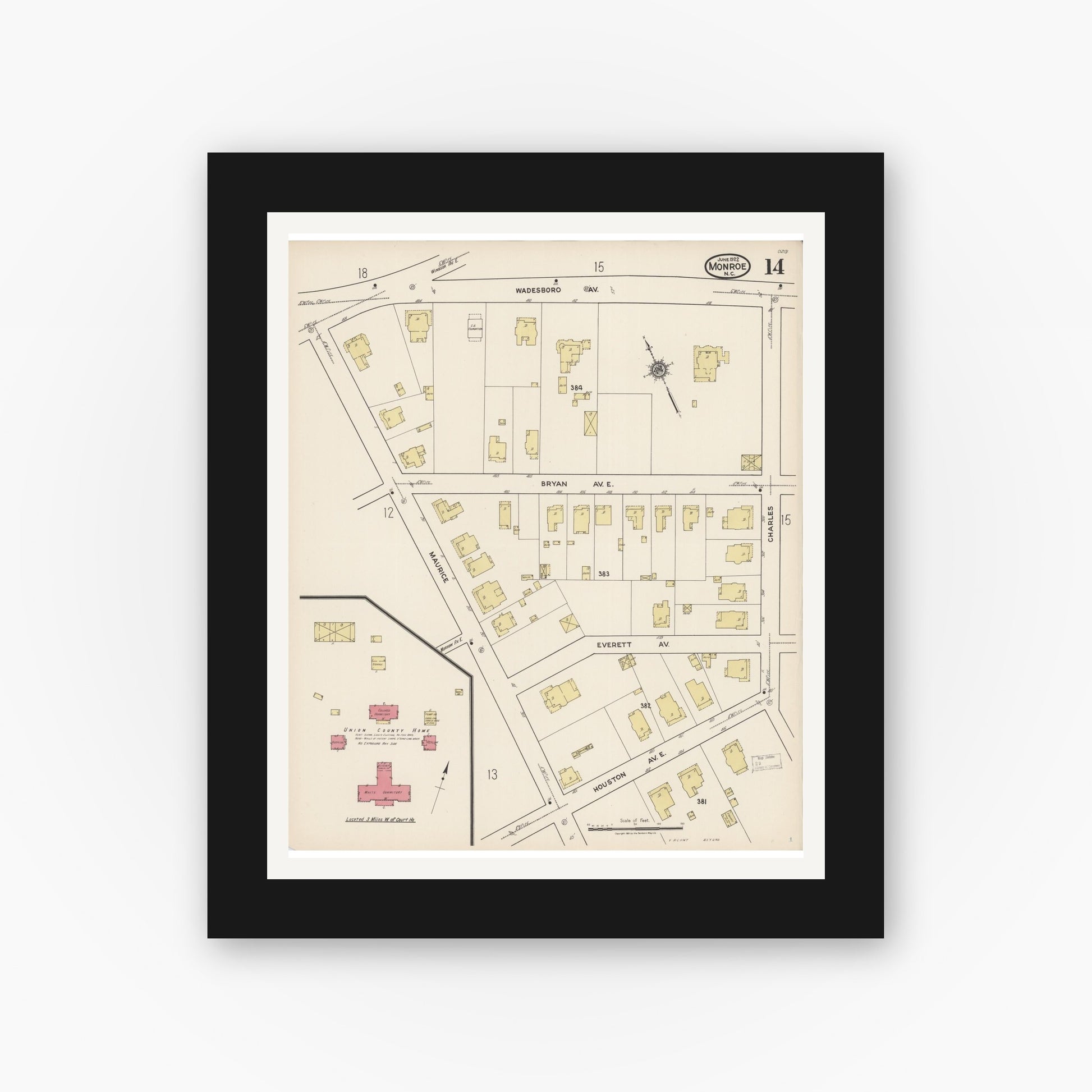 Old map wall art mockup — black gallery frame with white mat — Sanborn Fire Insurance Map from Monroe, Union County, North Carolina (1922), Sheet #0014