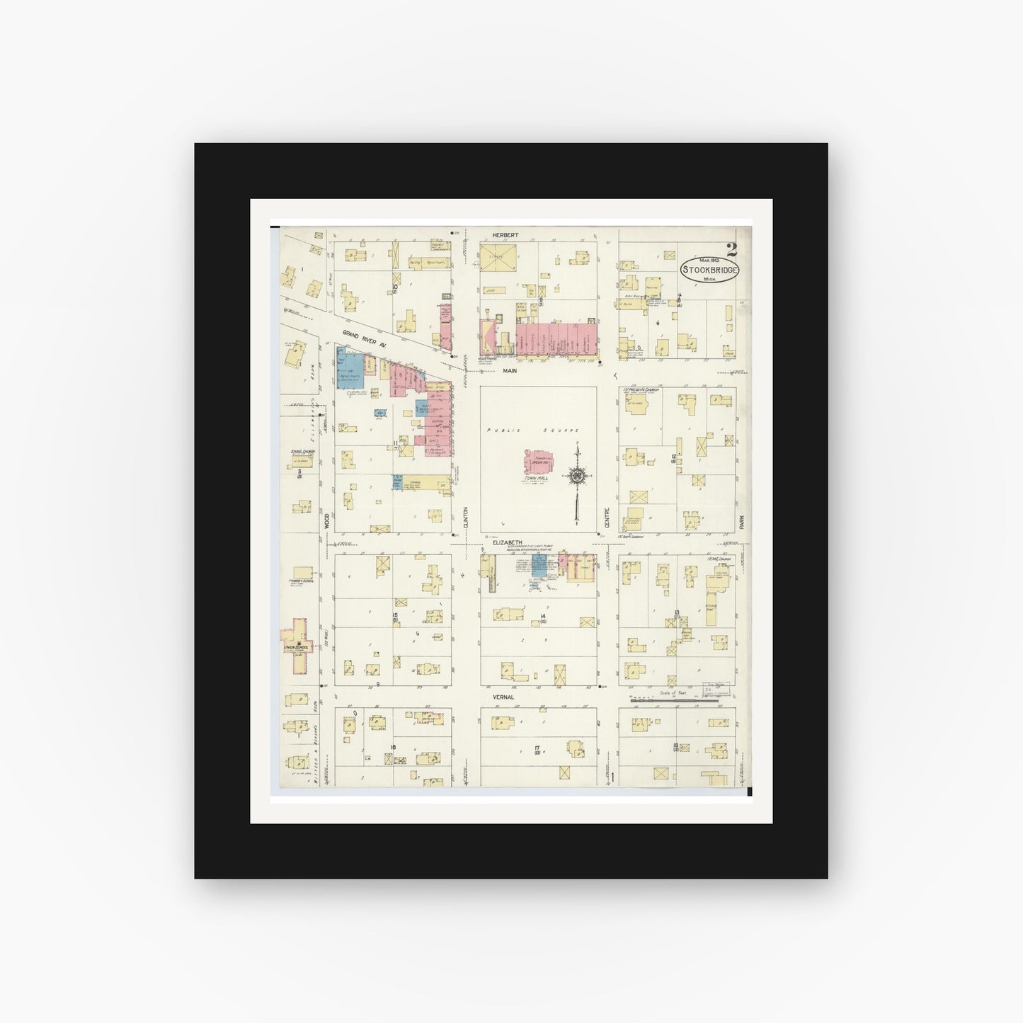 Old map wall art mockup — black gallery frame with white mat — Sanborn Fire Insurance Map from Stockbridge, Ingham County, Michigan (1913), Sheet #0002