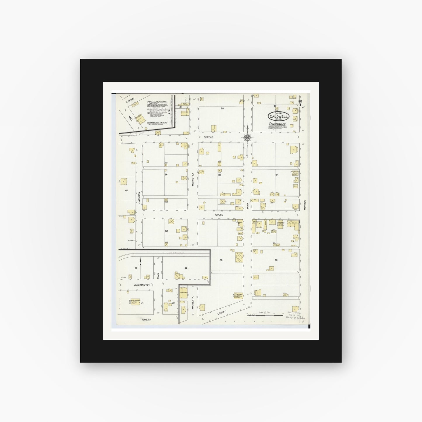 Old map wall art mockup — black gallery frame with white mat — Sanborn Fire Insurance Map from Caldwell, Noble County, Ohio (1911), Sheet #0007