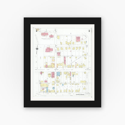 Old map wall art mockup — black gallery frame with white mat — Sanborn Fire Insurance Map from New Concord, Muskingum County, Ohio (1946), Sheet #0002