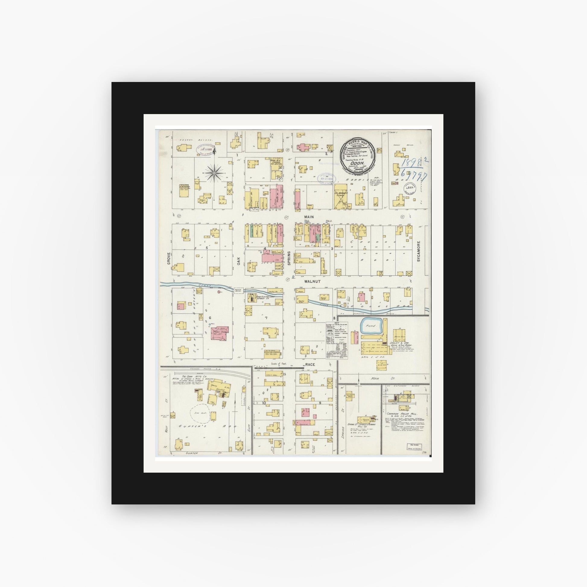 Old map wall art mockup — black gallery frame with white mat — Sanborn Fire Insurance Map from Odon, Daviess County, Indiana (1898), Sheet #0001