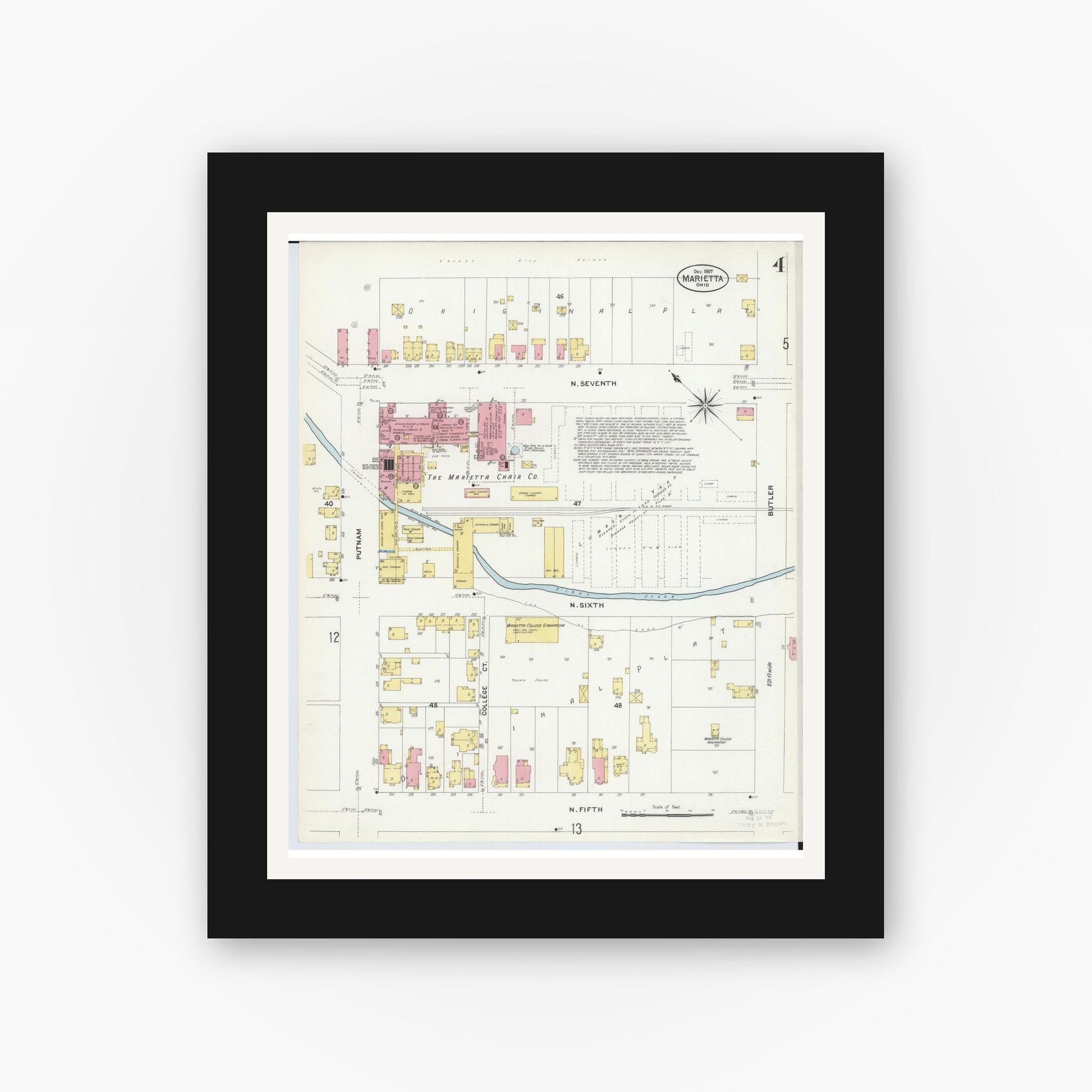 Old map wall art mockup — black gallery frame with white mat — Sanborn Fire Insurance Map from Marietta, Washington County, Ohio (1907), Sheet #0004