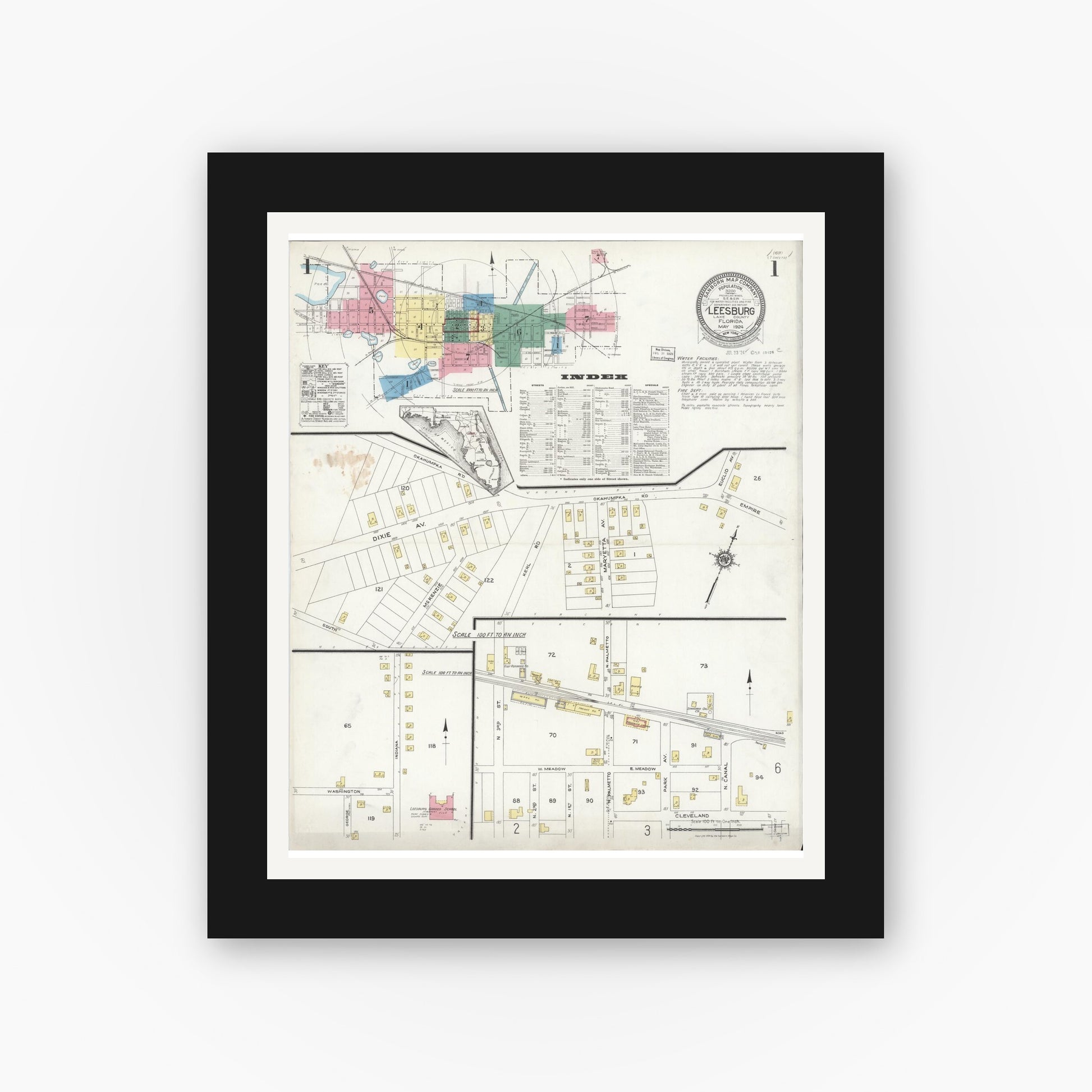 Old map wall art mockup — black gallery frame with white mat — Sanborn Fire Insurance Map from Leesburg, Lake County, Florida (1924), Sheet #0001