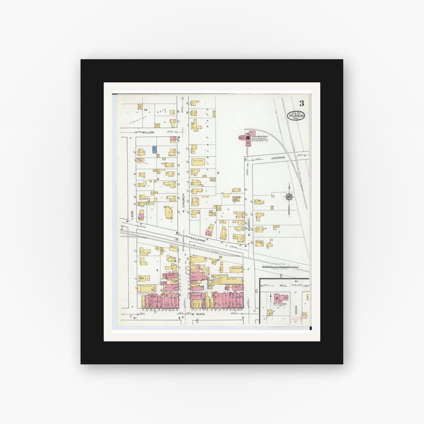 Old map wall art mockup — black gallery frame with white mat — Sanborn Fire Insurance Map from Hudson, Lenawee County, Michigan (1919), Sheet #0003