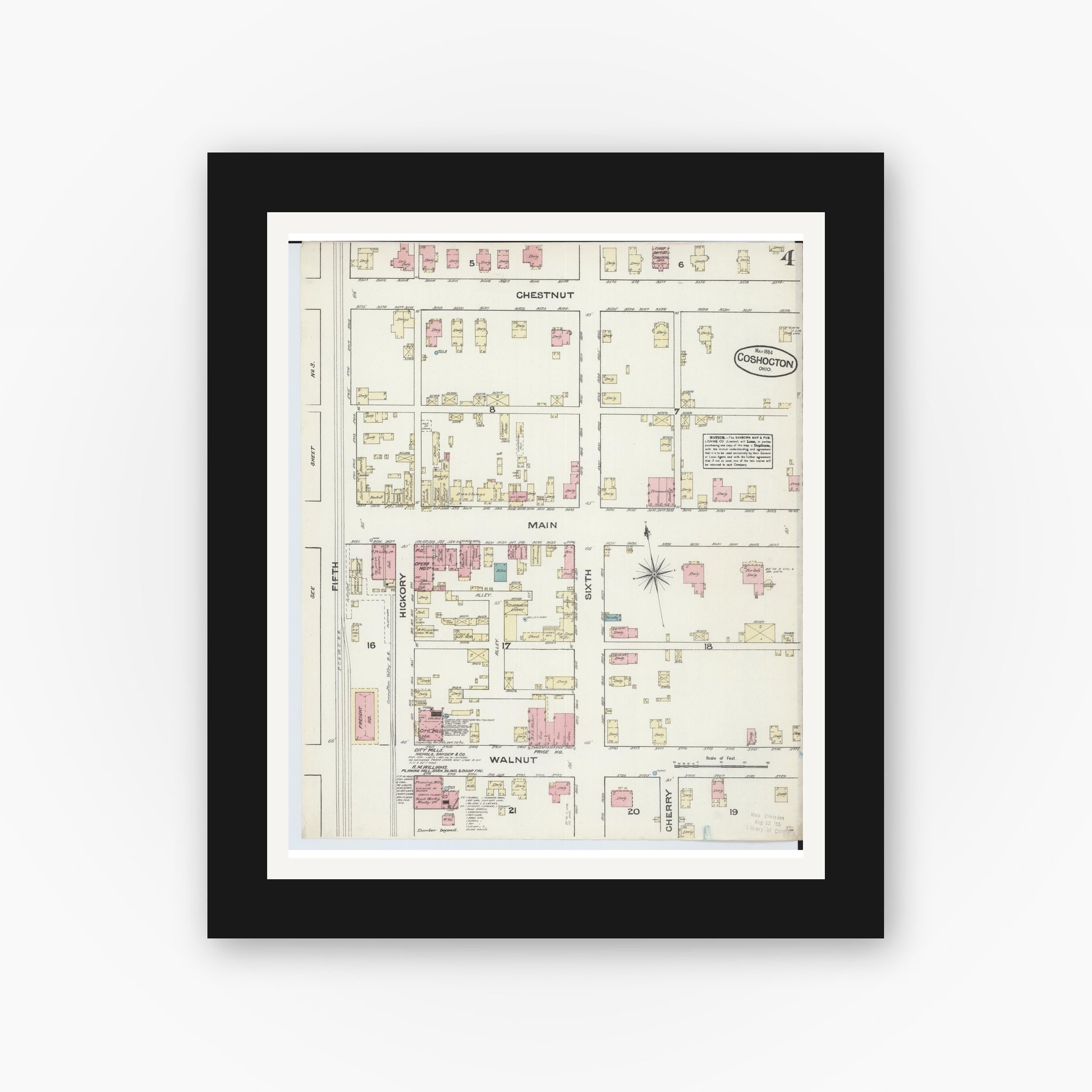 Old map wall art mockup — black gallery frame with white mat — Sanborn Fire Insurance Map from Coshocton, Coshocton County, Ohio (1884), Sheet #0004