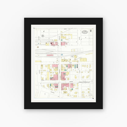 Old map wall art mockup — black gallery frame with white mat — Sanborn Fire Insurance Map from Colfax, Jasper County, Iowa (1906), Sheet #0002