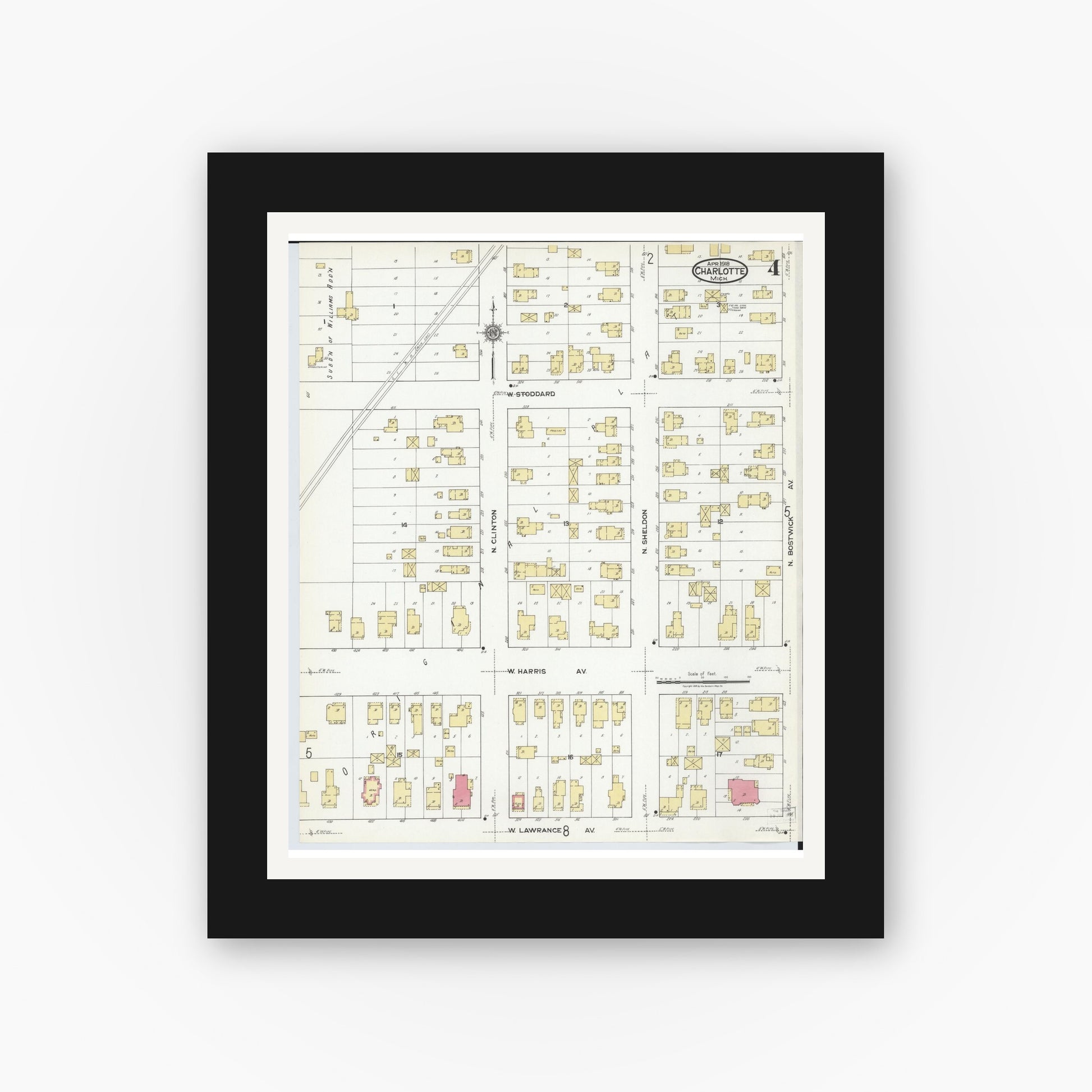 Old map wall art mockup — black gallery frame with white mat — Sanborn Fire Insurance Map from Charlotte, Eaton County, Michigan (1918), Sheet #0004