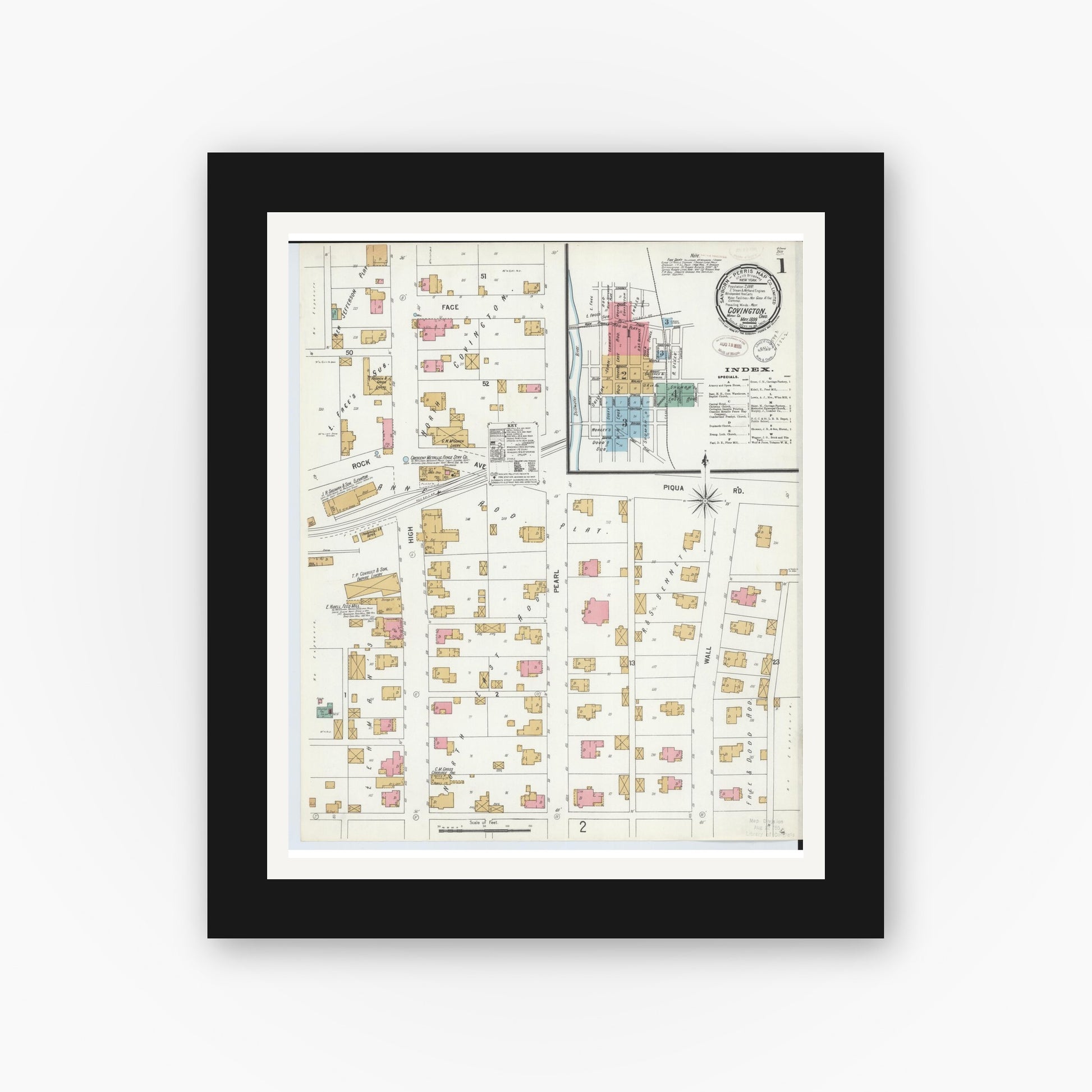 Old map wall art mockup — black gallery frame with white mat — Sanborn Fire Insurance Map from Covington, Miami County, Ohio (1899), Sheet #0001