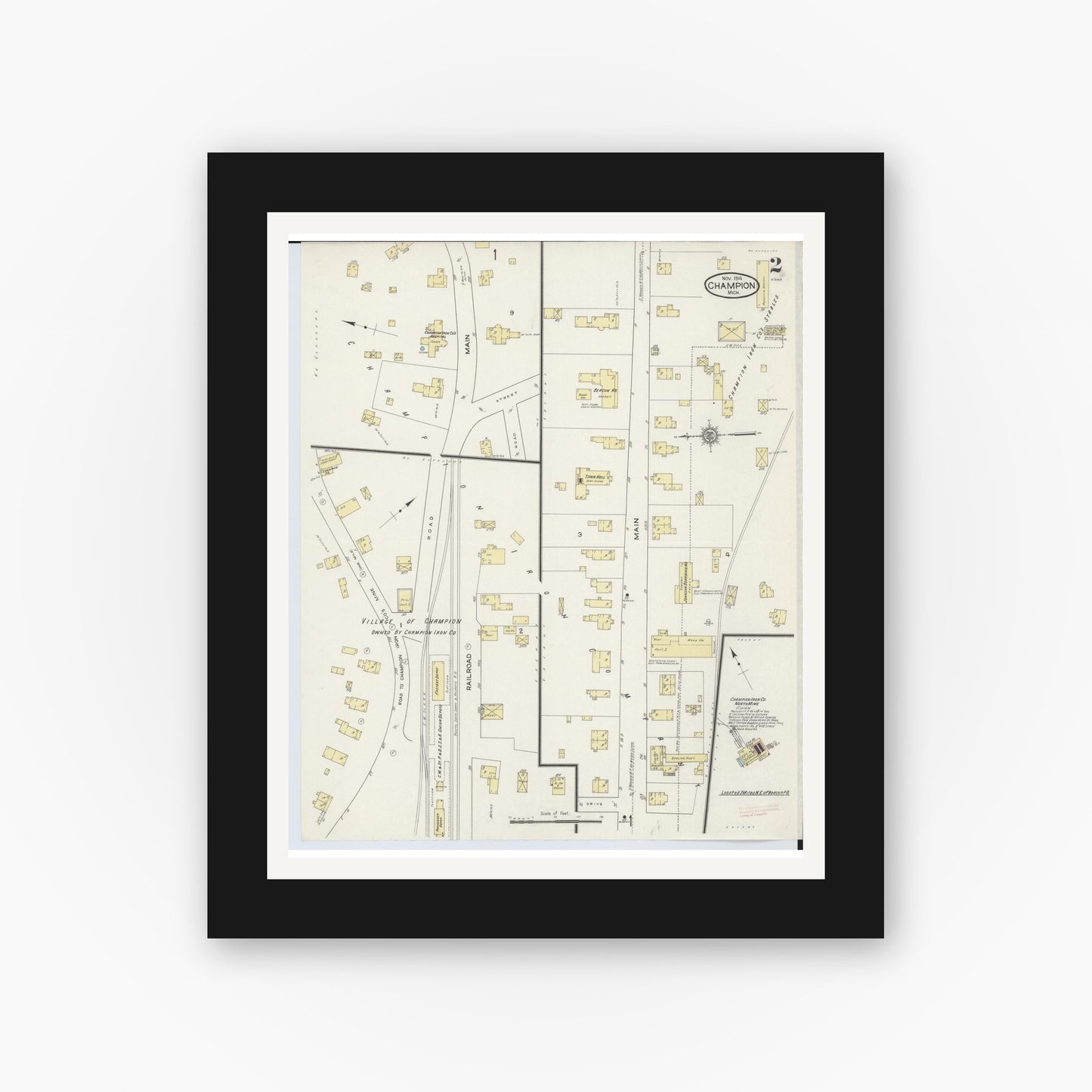 Old map wall art mockup — black gallery frame with white mat — Sanborn Fire Insurance Map from Champion, Marquette County, Michigan (1914), Sheet #0002