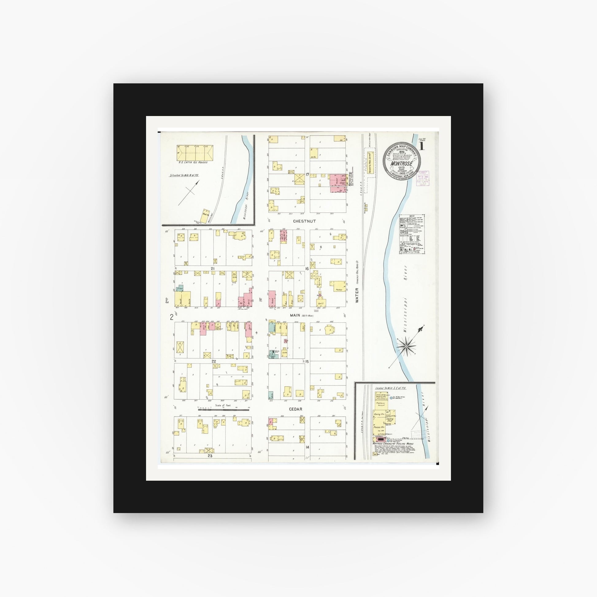 Old map wall art mockup — black gallery frame with white mat — Sanborn Fire Insurance Map from Montrose, Lee County, Iowa (1902) â€” Complete Set