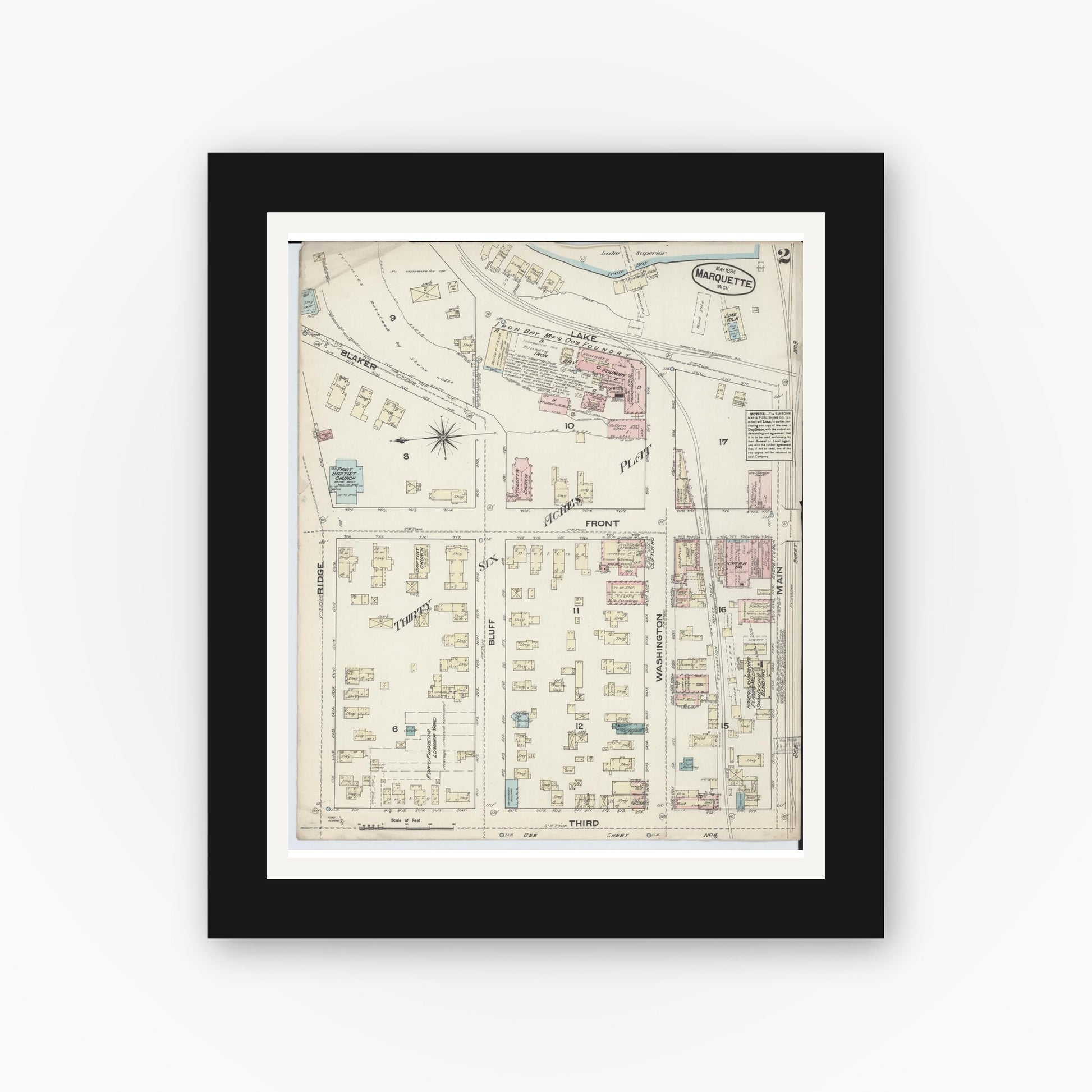 Old map wall art mockup — black gallery frame with white mat — Sanborn Fire Insurance Map from Marquette, Marquette County, Michigan (1884), Sheet #0002