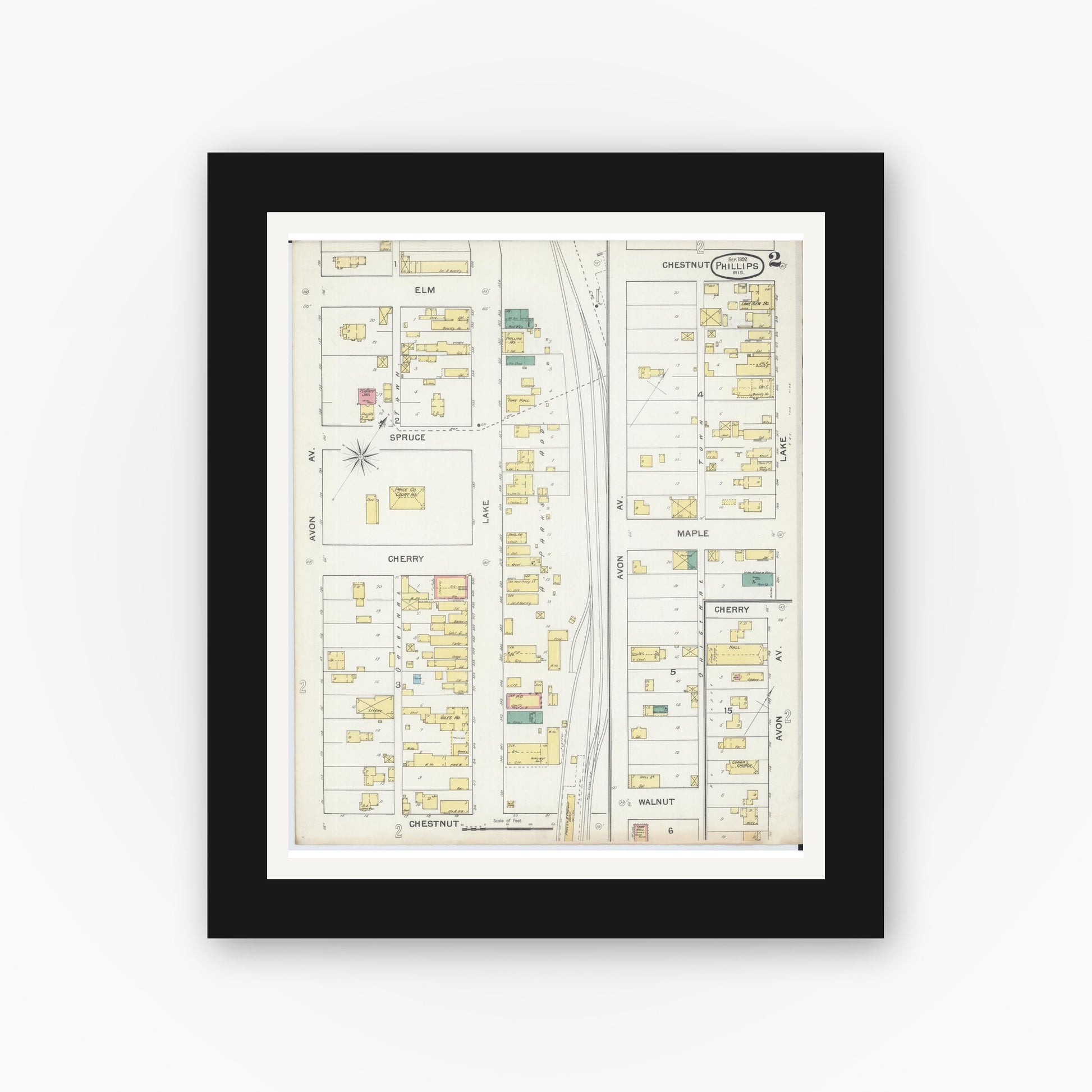 Old map wall art mockup — black gallery frame with white mat — Sanborn Fire Insurance Map from Phillips, Price County, Wisconsin (1892), Sheet #0002