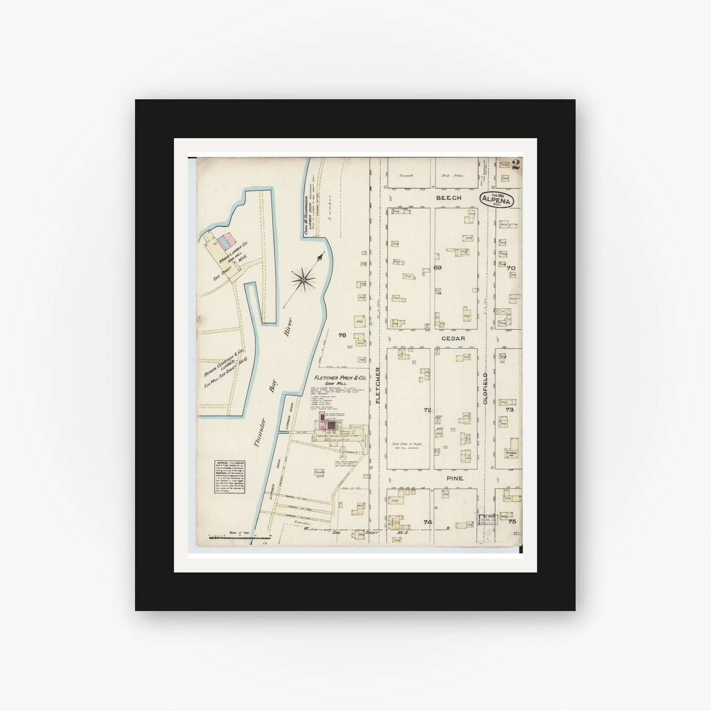Old map wall art mockup — black gallery frame with white mat — Sanborn Fire Insurance Map from Alpena, Alpena County, Michigan (1884), Sheet #0002