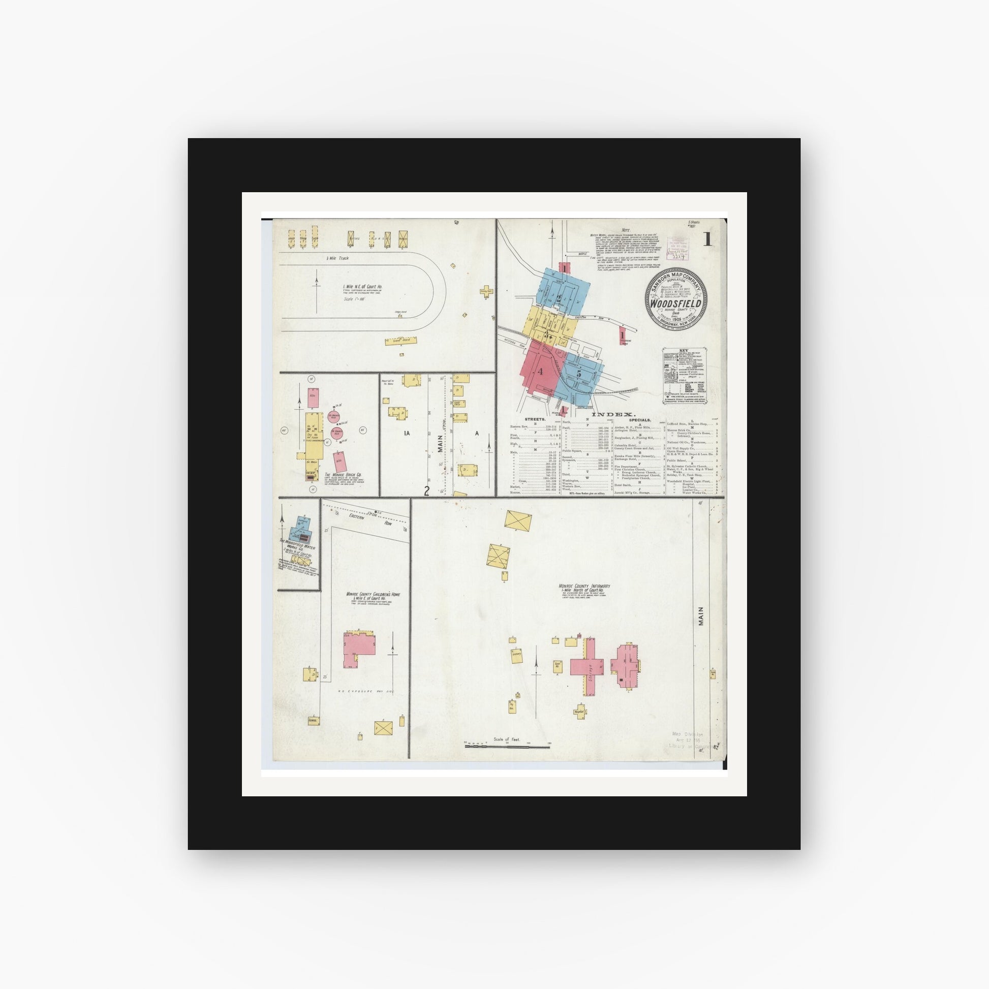 Old map wall art mockup — black gallery frame with white mat — Sanborn Fire Insurance Map from Woodsfield, Monroe County, Ohio (1905), Sheet #0001