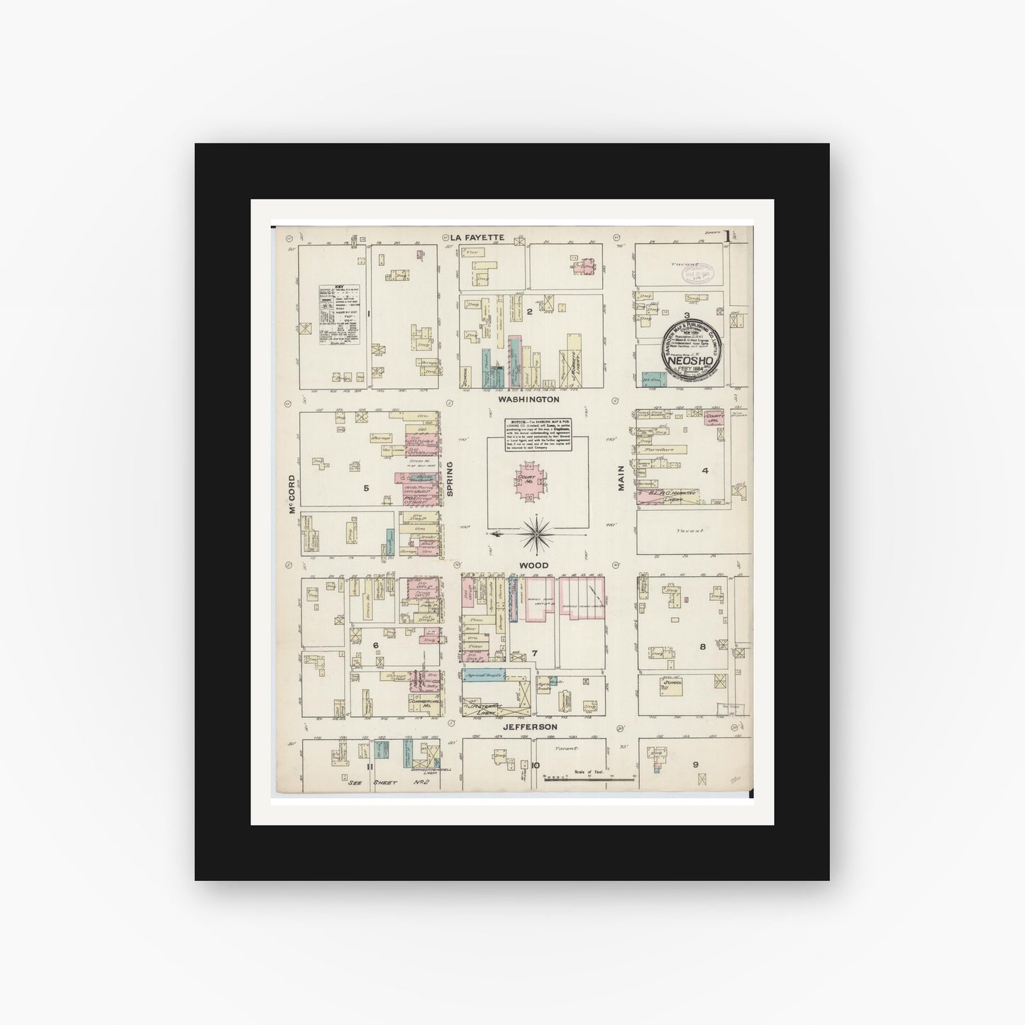 Old map wall art mockup — black gallery frame with white mat — Sanborn Fire Insurance Map from Neosho, Newton County, Missouri (1884), Sheet #0001