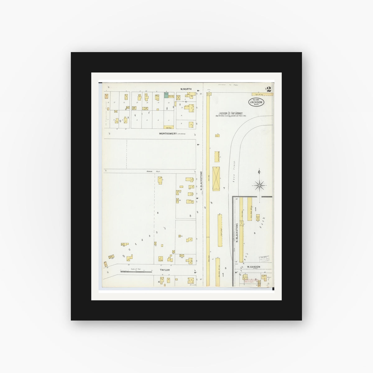 Old map wall art mockup — black gallery frame with white mat — Sanborn Fire Insurance Map from Jackson, Jackson County, Michigan (1899), Sheet #0002