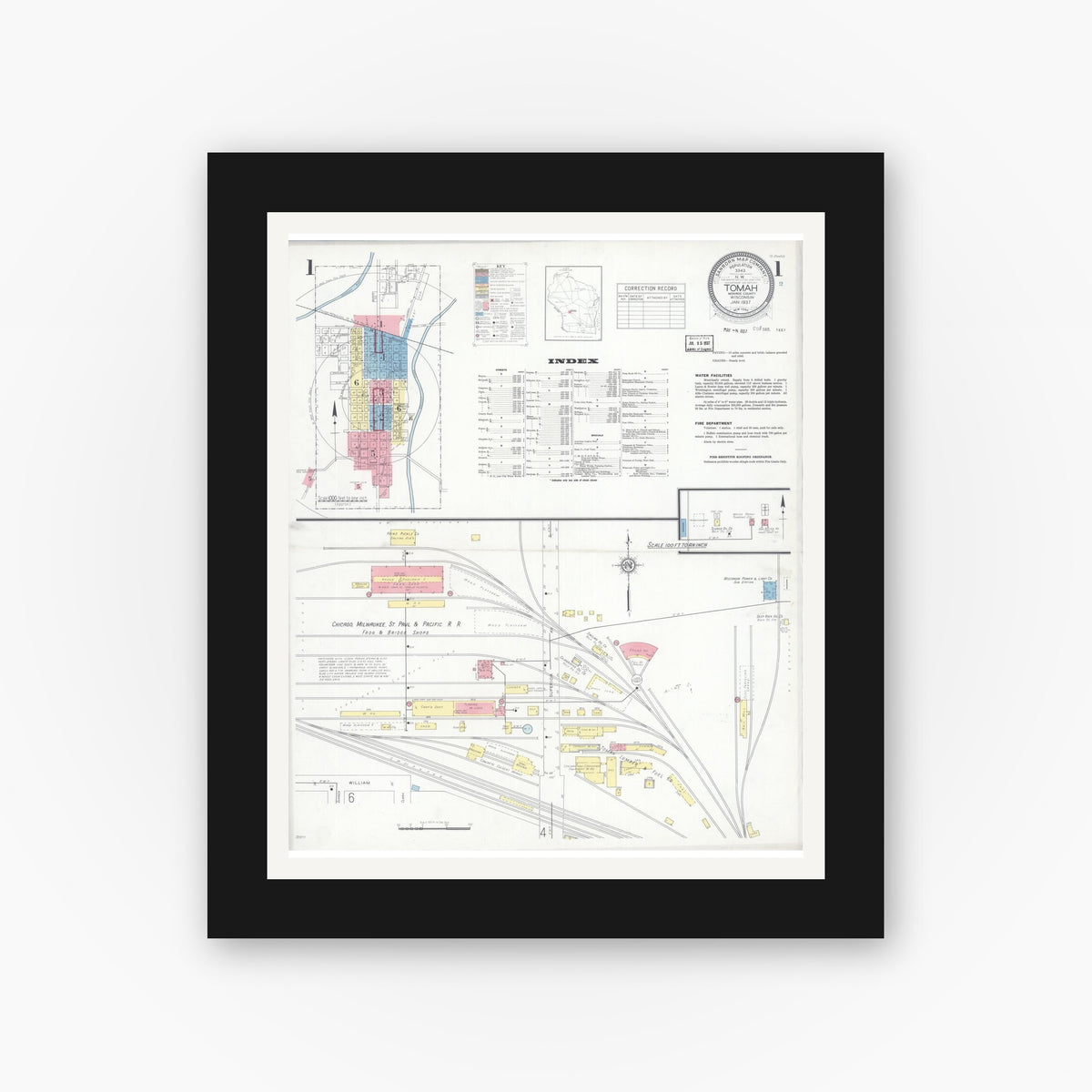 Old map wall art mockup — black gallery frame with white mat — Sanborn Fire Insurance Map from Tomah, Monroe County, Wisconsin (1937), Sheet #0001