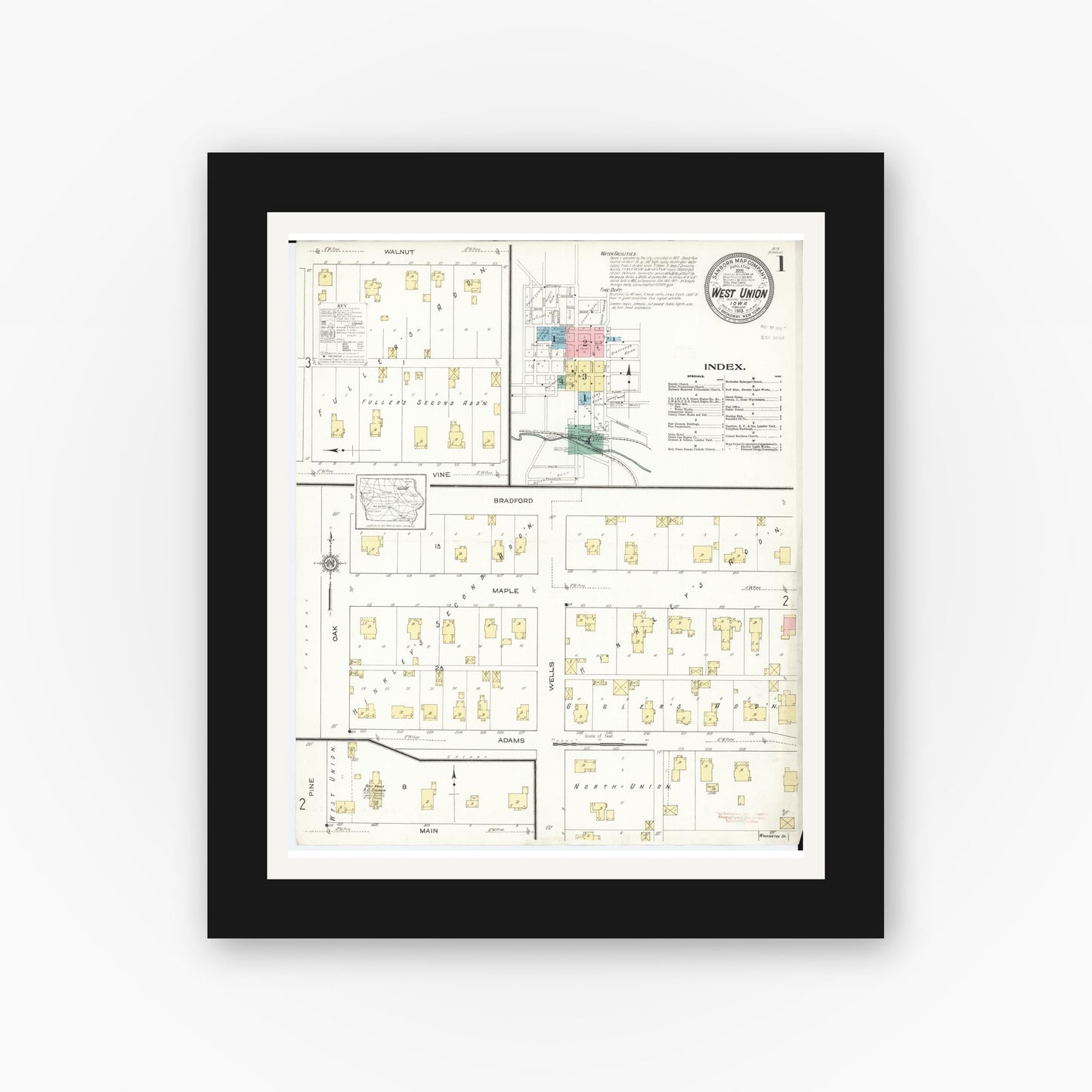 Old map wall art mockup — black gallery frame with white mat — Sanborn Fire Insurance Map from West Union, Fayette County, Iowa (1913), Sheet #0001