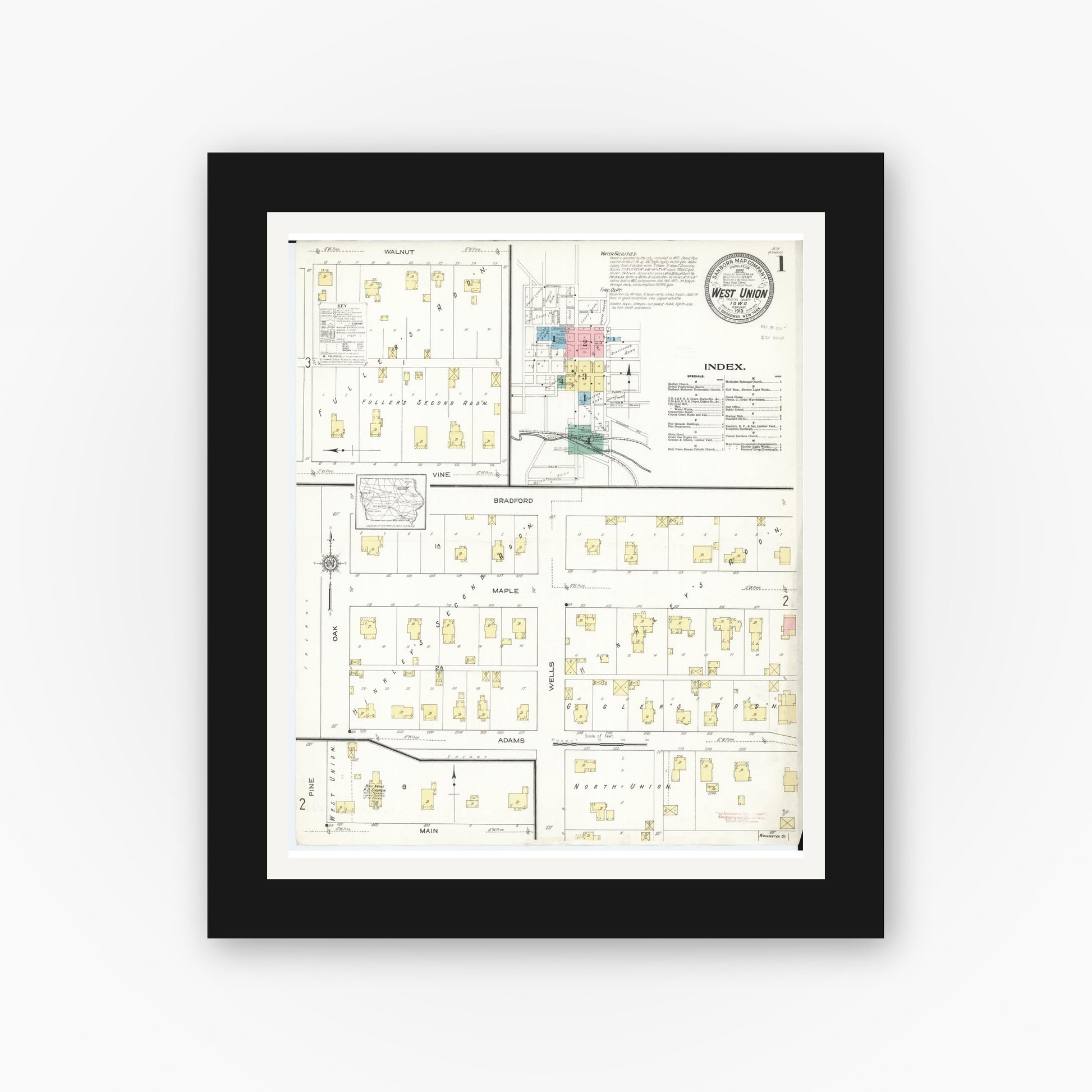 Old map wall art mockup — black gallery frame with white mat — Sanborn Fire Insurance Map from West Union, Fayette County, Iowa (1913), Sheet #0001