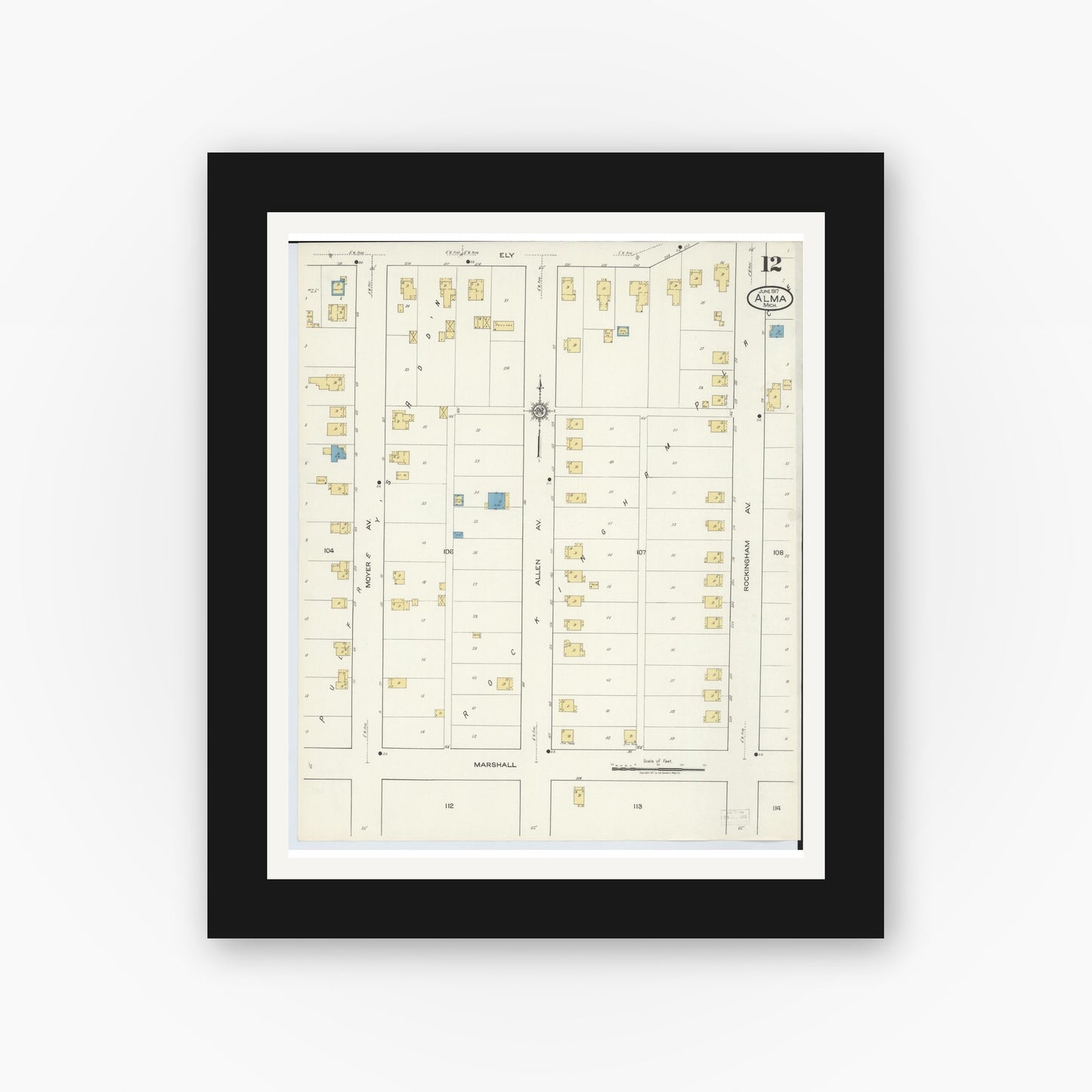 Old map wall art mockup — black gallery frame with white mat — Sanborn Fire Insurance Map from Alma, Gratiot County, Michigan (1917), Sheet #0012
