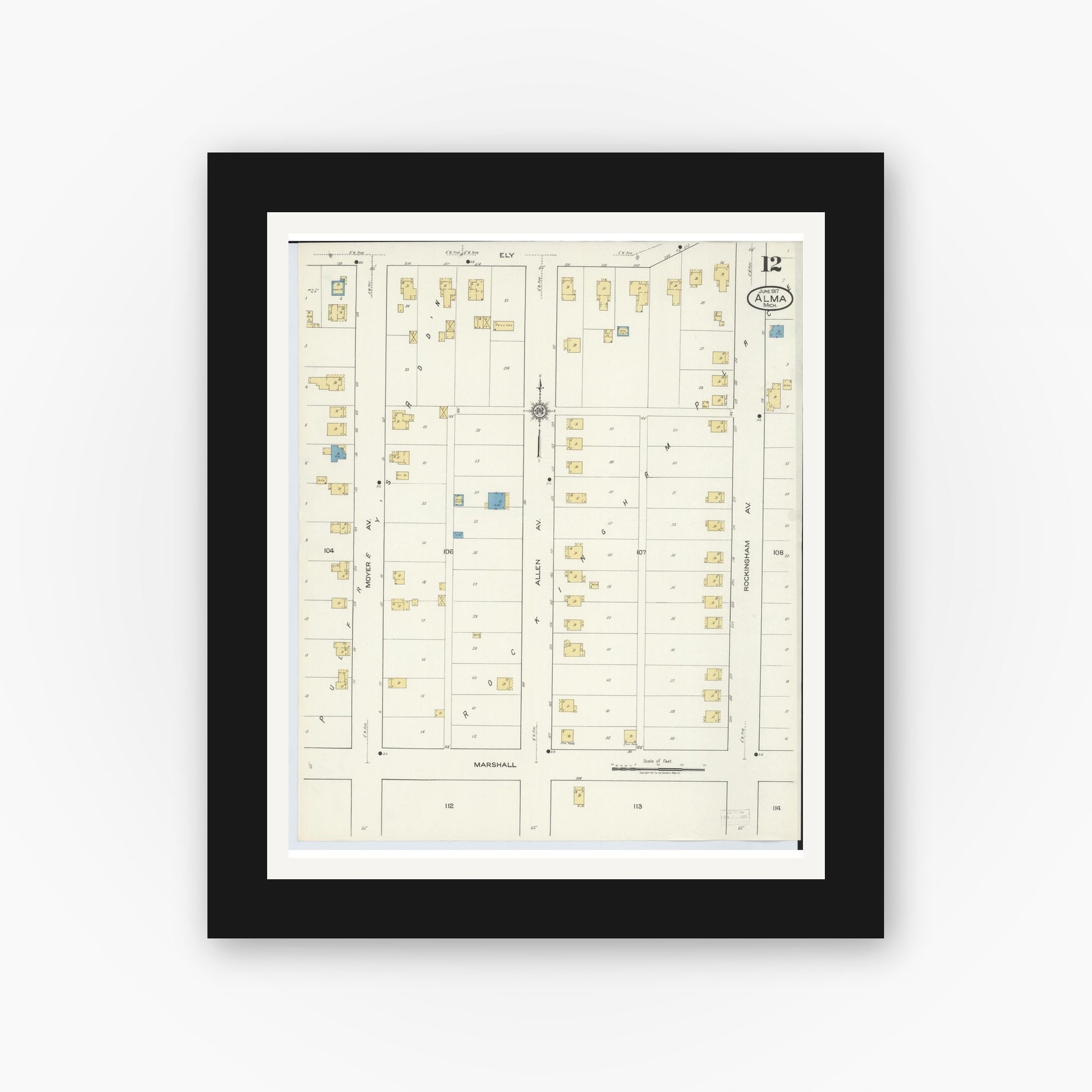Old map wall art mockup — black gallery frame with white mat — Sanborn Fire Insurance Map from Alma, Gratiot County, Michigan (1917), Sheet #0012