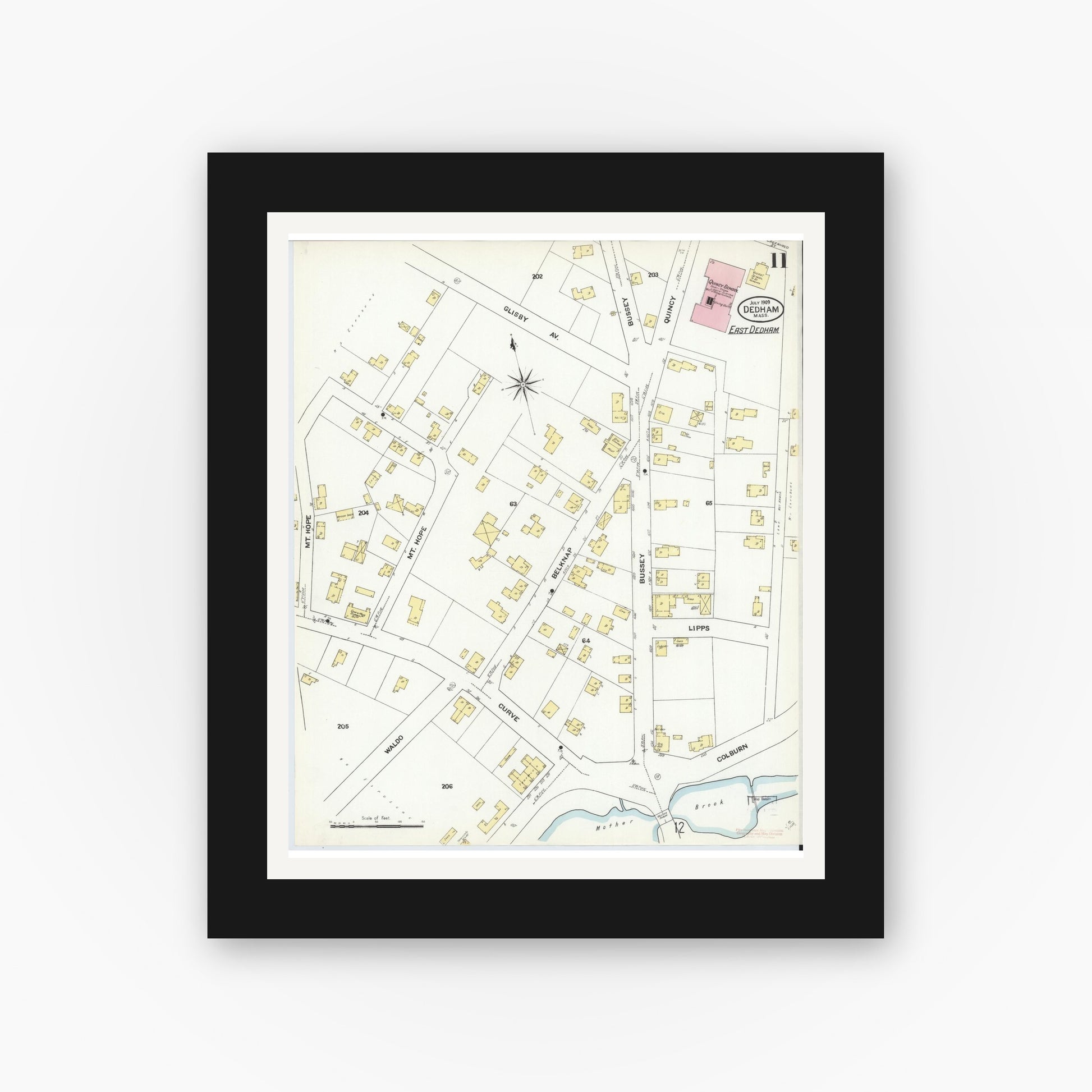 Old map wall art mockup — black gallery frame with white mat — Sanborn Fire Insurance Map from Dedham, Norfolk County, Massachusetts (1909), Sheet #0011