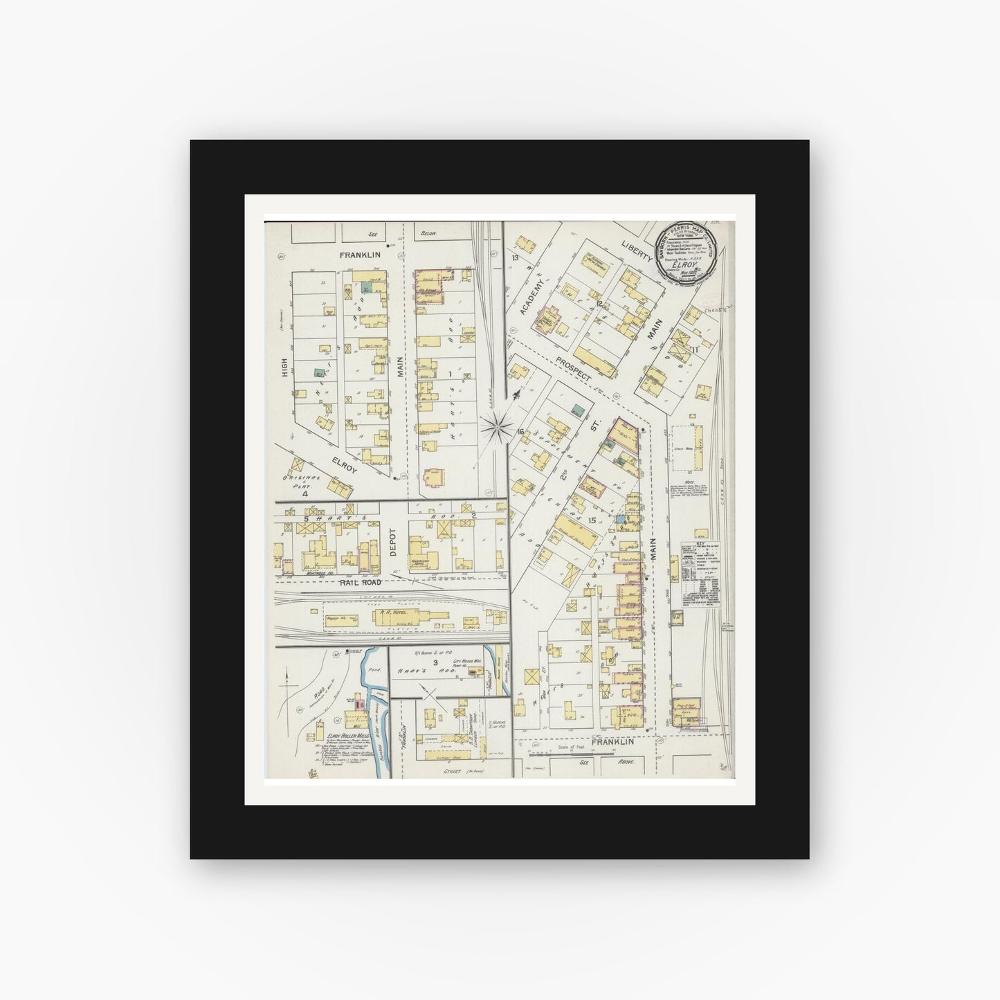 Old map wall art mockup — black gallery frame with white mat — Sanborn Fire Insurance Map from Elroy, Juneau County, Wisconsin (1892), Sheet #0001