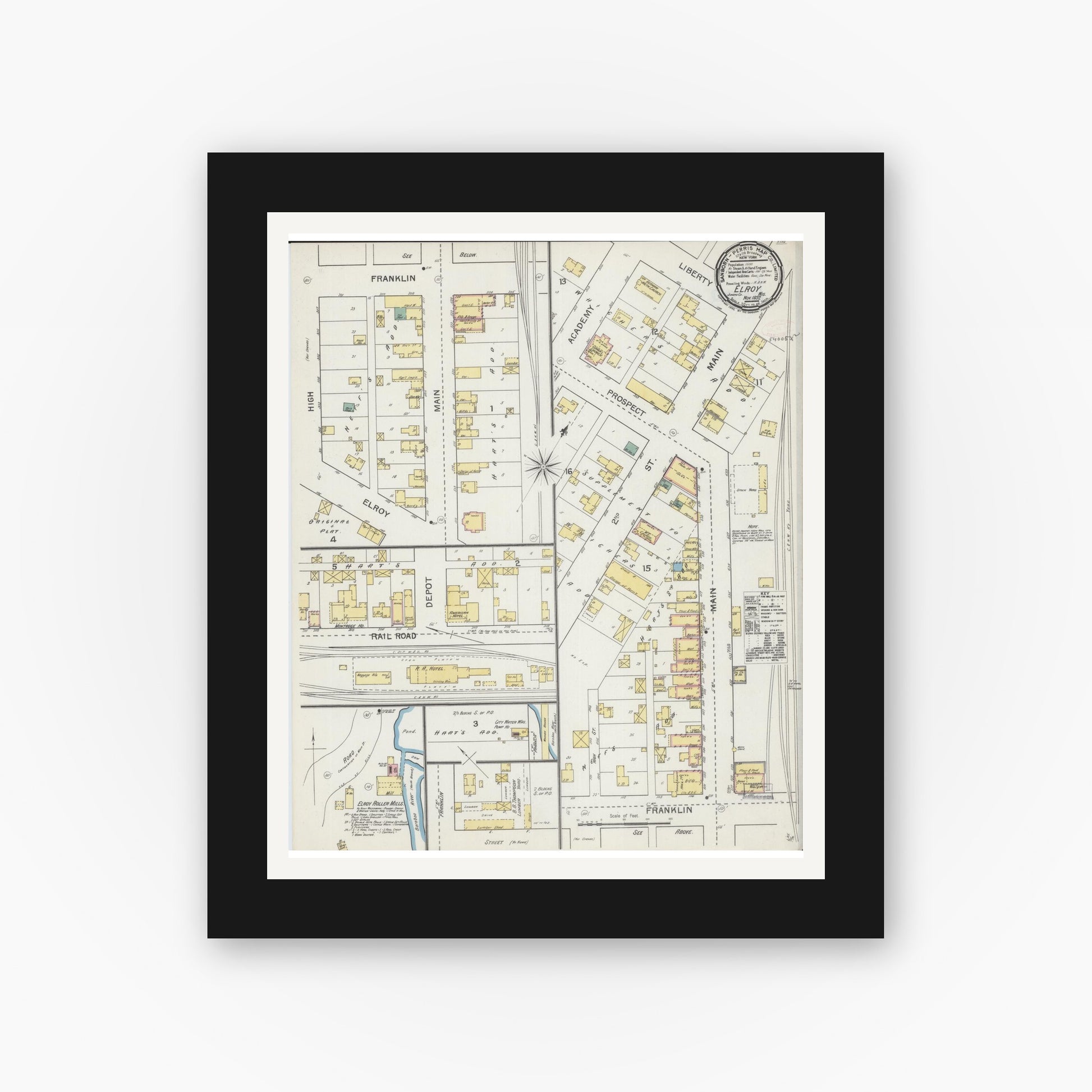 Old map wall art mockup — black gallery frame with white mat — Sanborn Fire Insurance Map from Elroy, Juneau County, Wisconsin (1892), Sheet #0001