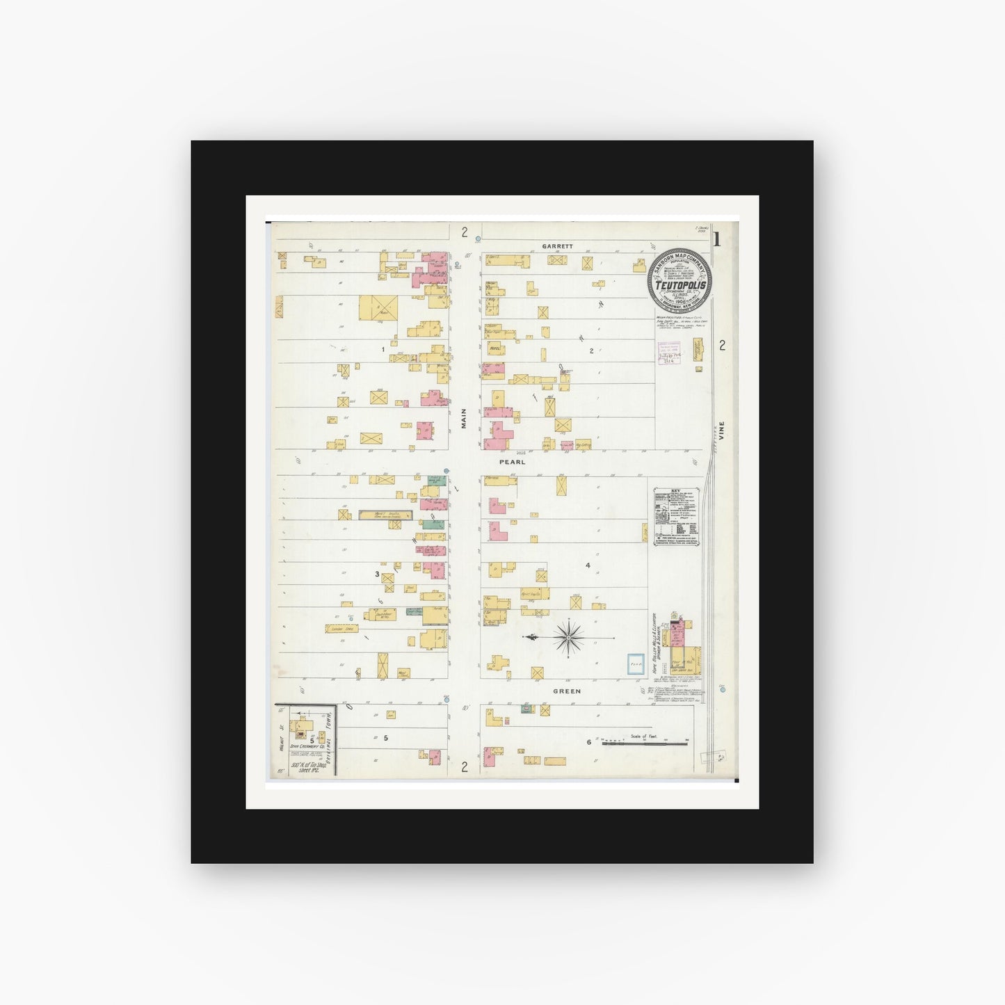 Old map wall art mockup — black gallery frame with white mat — Sanborn Fire Insurance Map from Teutopolis, Effingham County, Illinois (1906), Sheet #0001