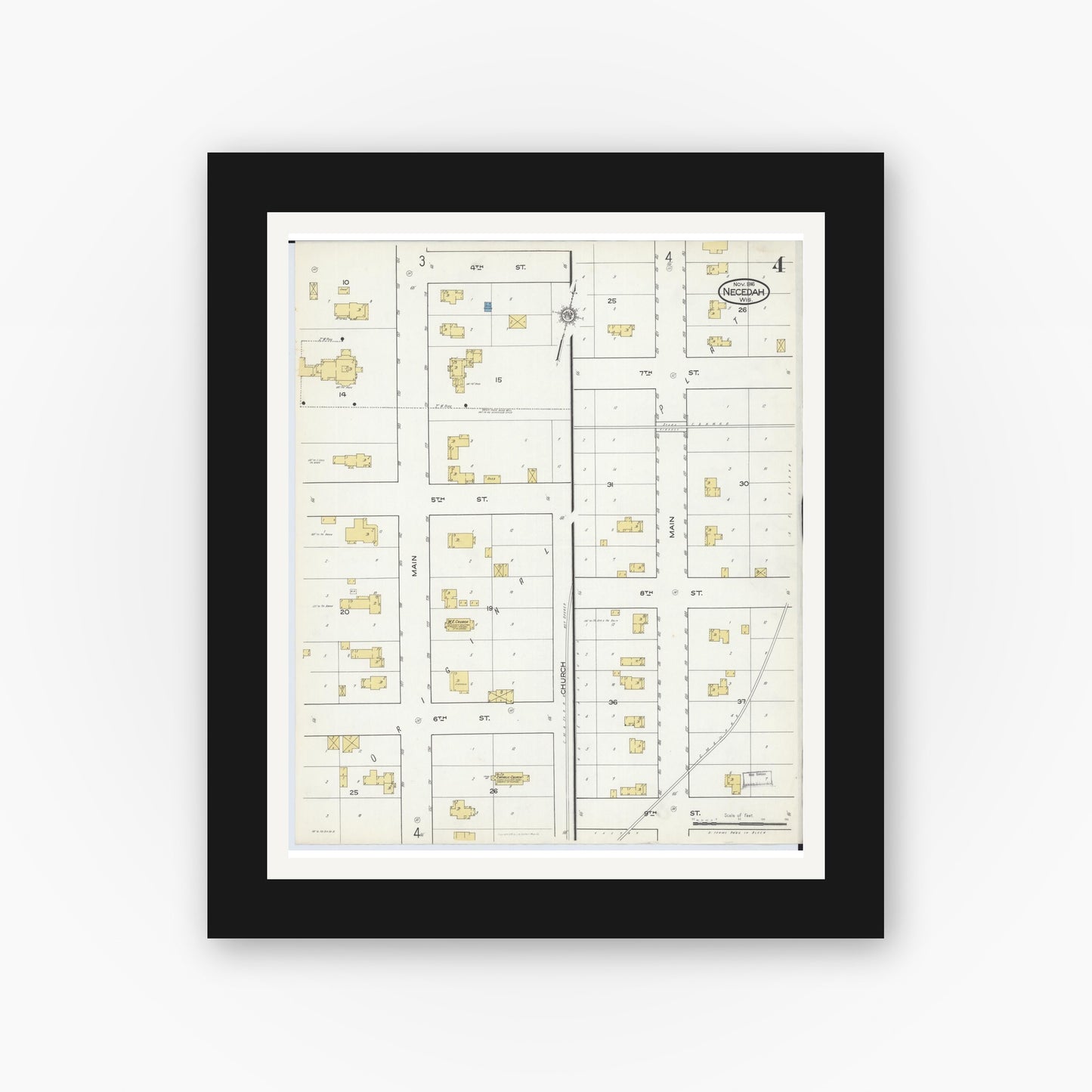 Old map wall art mockup — black gallery frame with white mat — Sanborn Fire Insurance Map from Necedah, Juneau County, Wisconsin (1916), Sheet #0004