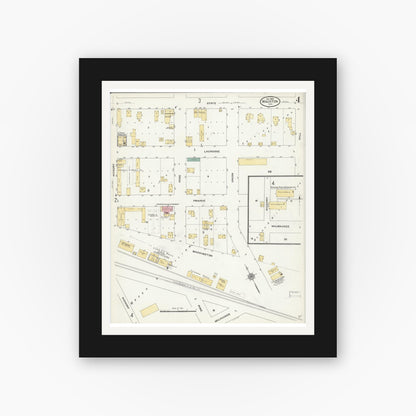 Old map wall art mockup — black gallery frame with white mat — Sanborn Fire Insurance Map from Mauston, Juneau County, Wisconsin (1909), Sheet #0004