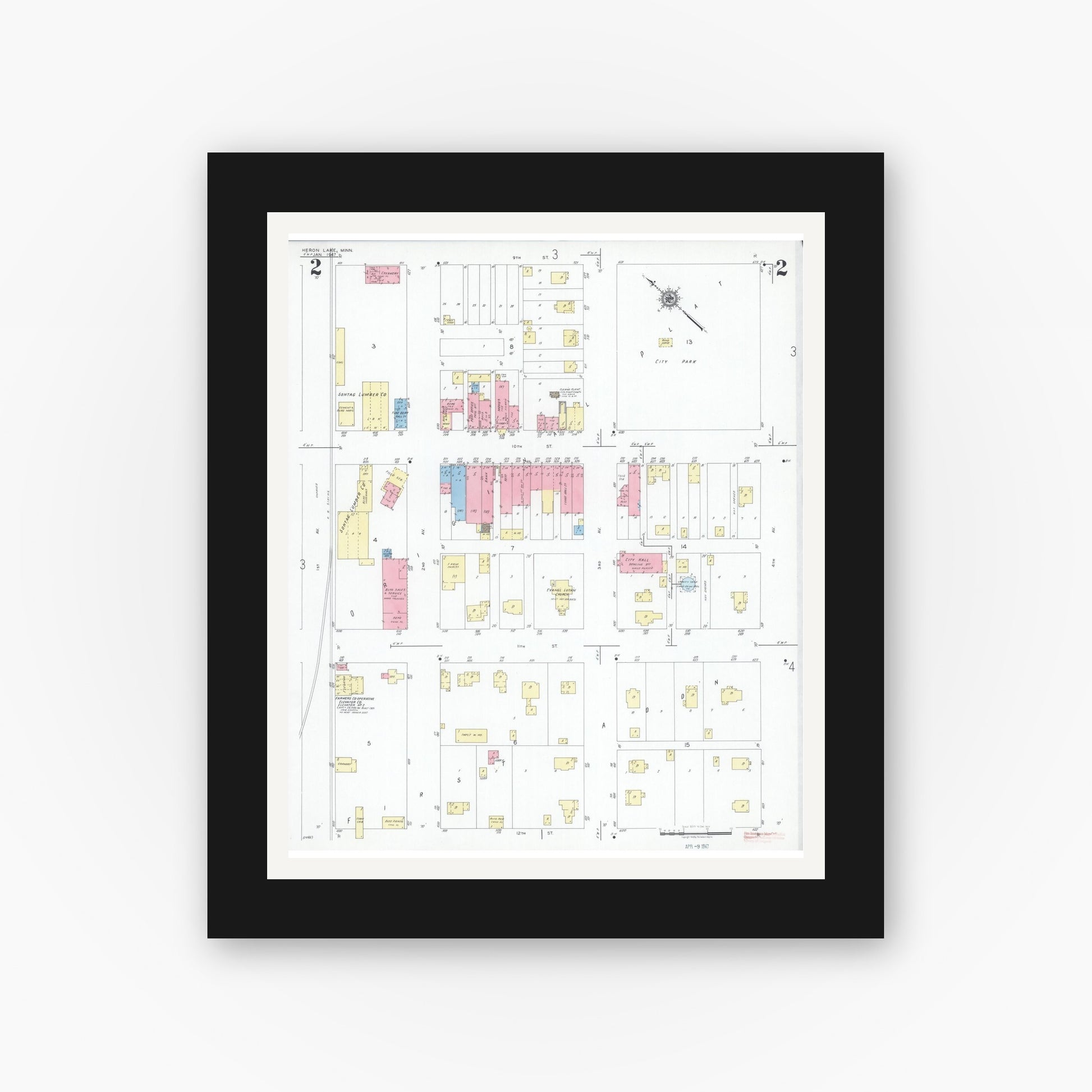 Old map wall art mockup — black gallery frame with white mat — Sanborn Fire Insurance Map from Heron Lake, Jackson County, Minnesota (1947), Sheet #0002