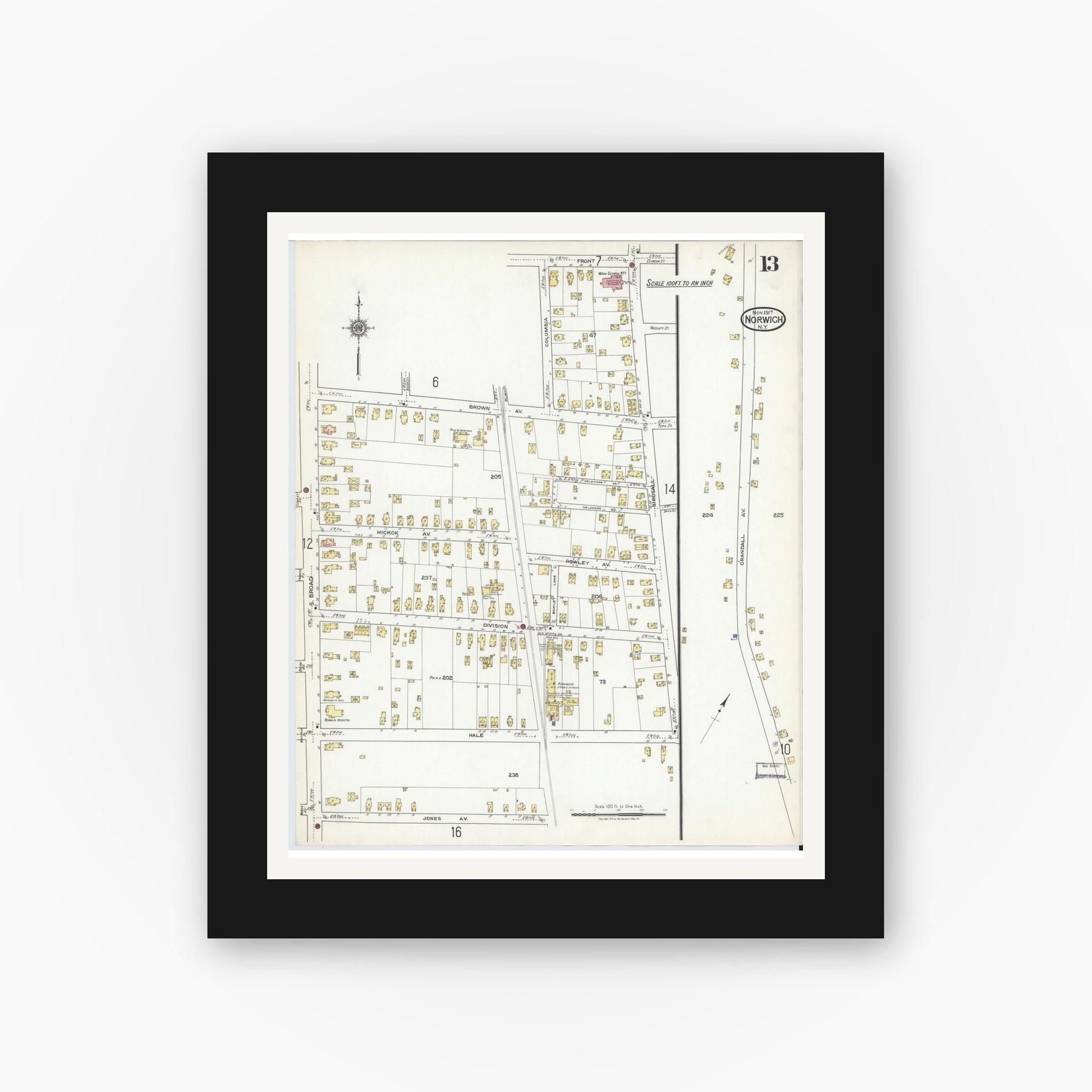 Old map wall art mockup — black gallery frame with white mat — Sanborn Fire Insurance Map from Norwich, Chenango County, New York (1917), Sheet #0013