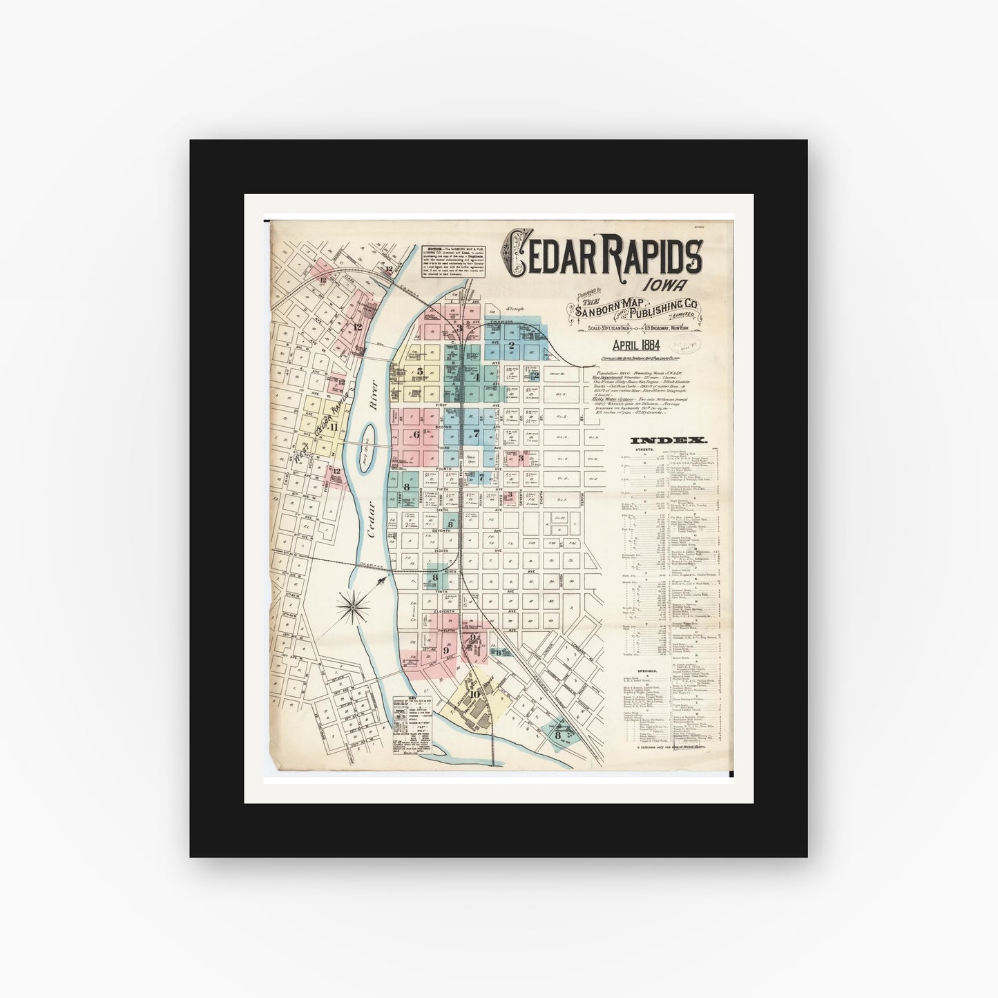 Old map wall art mockup — black gallery frame with white mat — Sanborn Fire Insurance Map from Cedar Rapids, Linn County, Iowa (1884) â€” Complete Set