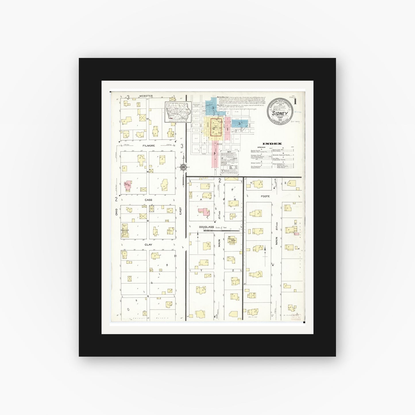 Old map wall art mockup — black gallery frame with white mat — Sanborn Fire Insurance Map from Sidney, Fremont County, Iowa (1914) â€” Complete Set