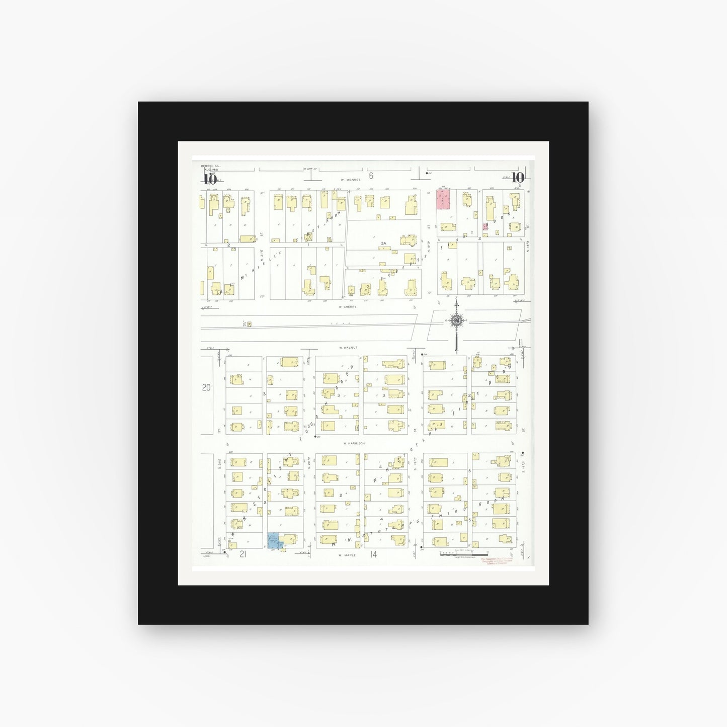 Old map wall art mockup — black gallery frame with white mat — Sanborn Fire Insurance Map from Herrin, Williamson County, Illinois (1941), Sheet #0010