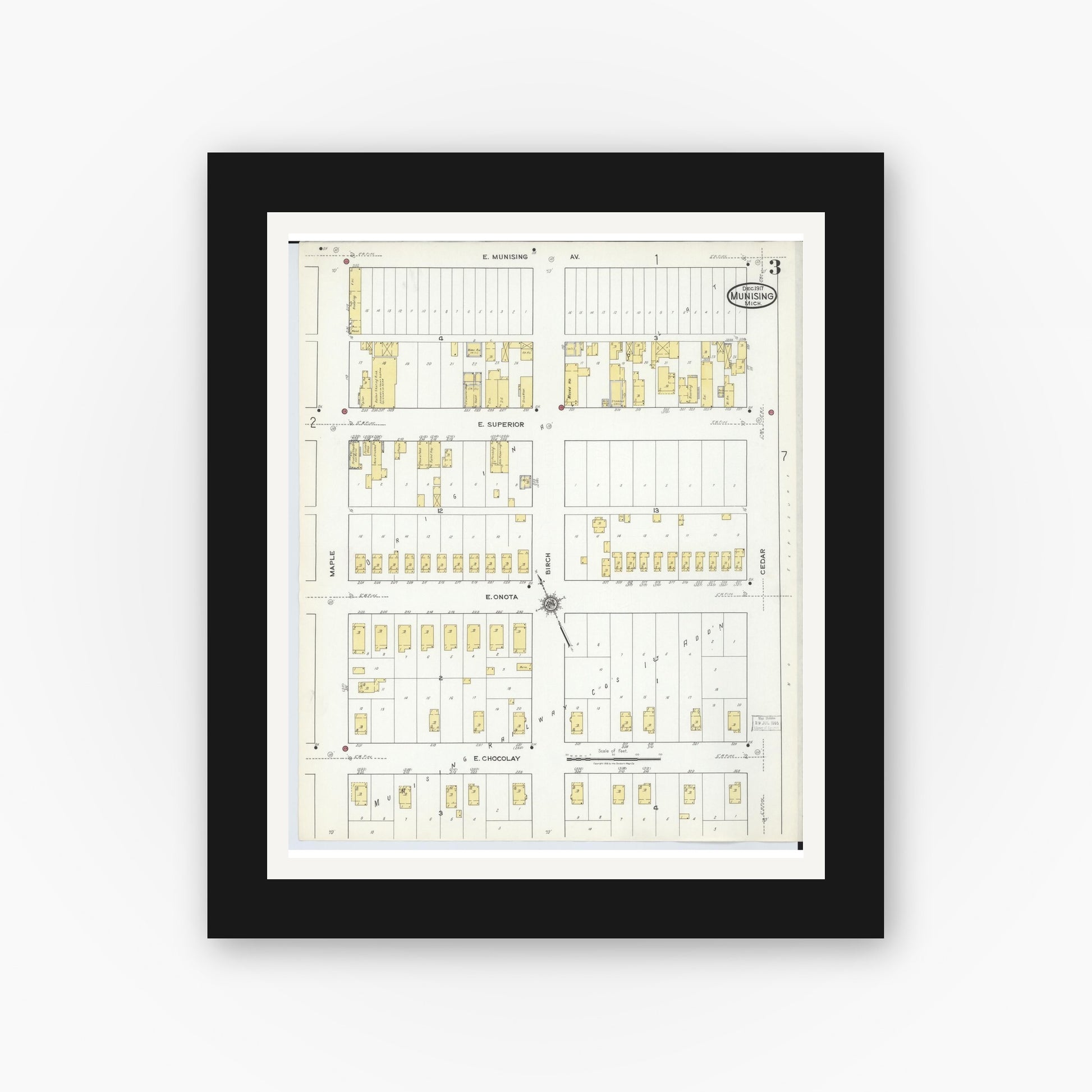 Old map wall art mockup — black gallery frame with white mat — Sanborn Fire Insurance Map from Munising, Alger County, Michigan (1917), Sheet #0003