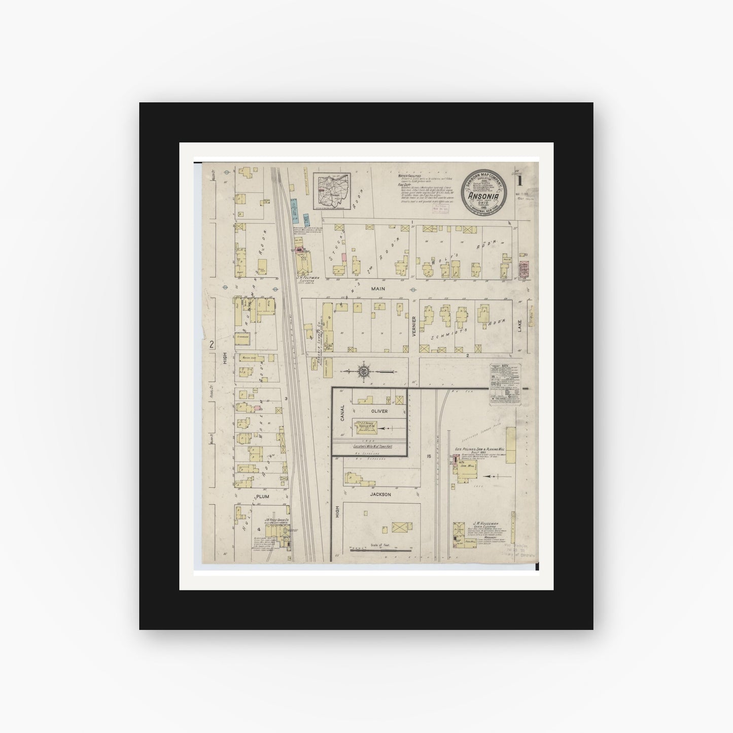 Old map wall art mockup — black gallery frame with white mat — Sanborn Fire Insurance Map from Ansonia, Darke County, Ohio (1915), Sheet #0001