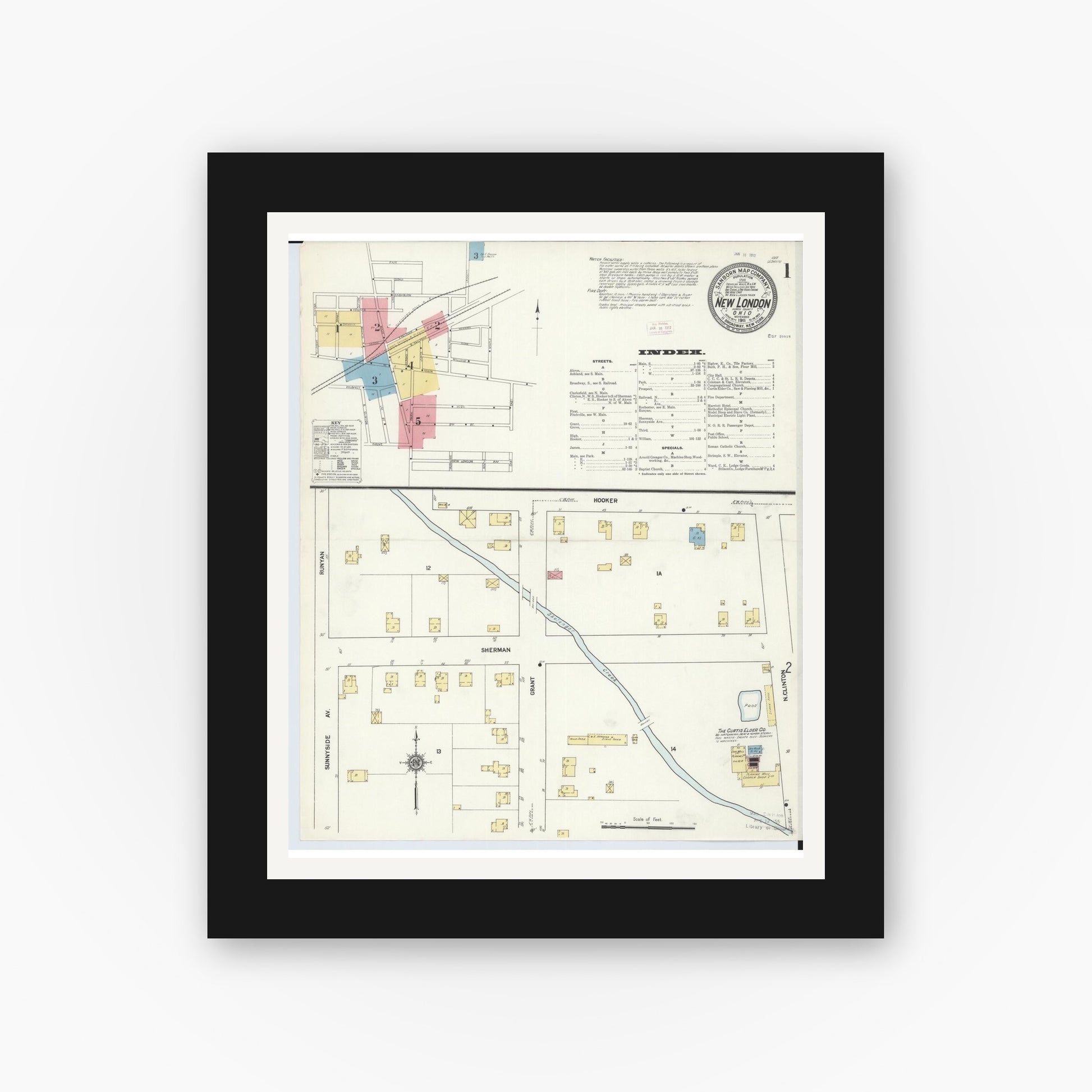 Old map wall art mockup — black gallery frame with white mat — Sanborn Fire Insurance Map from New London, Huron County, Ohio (1911), Sheet #0001