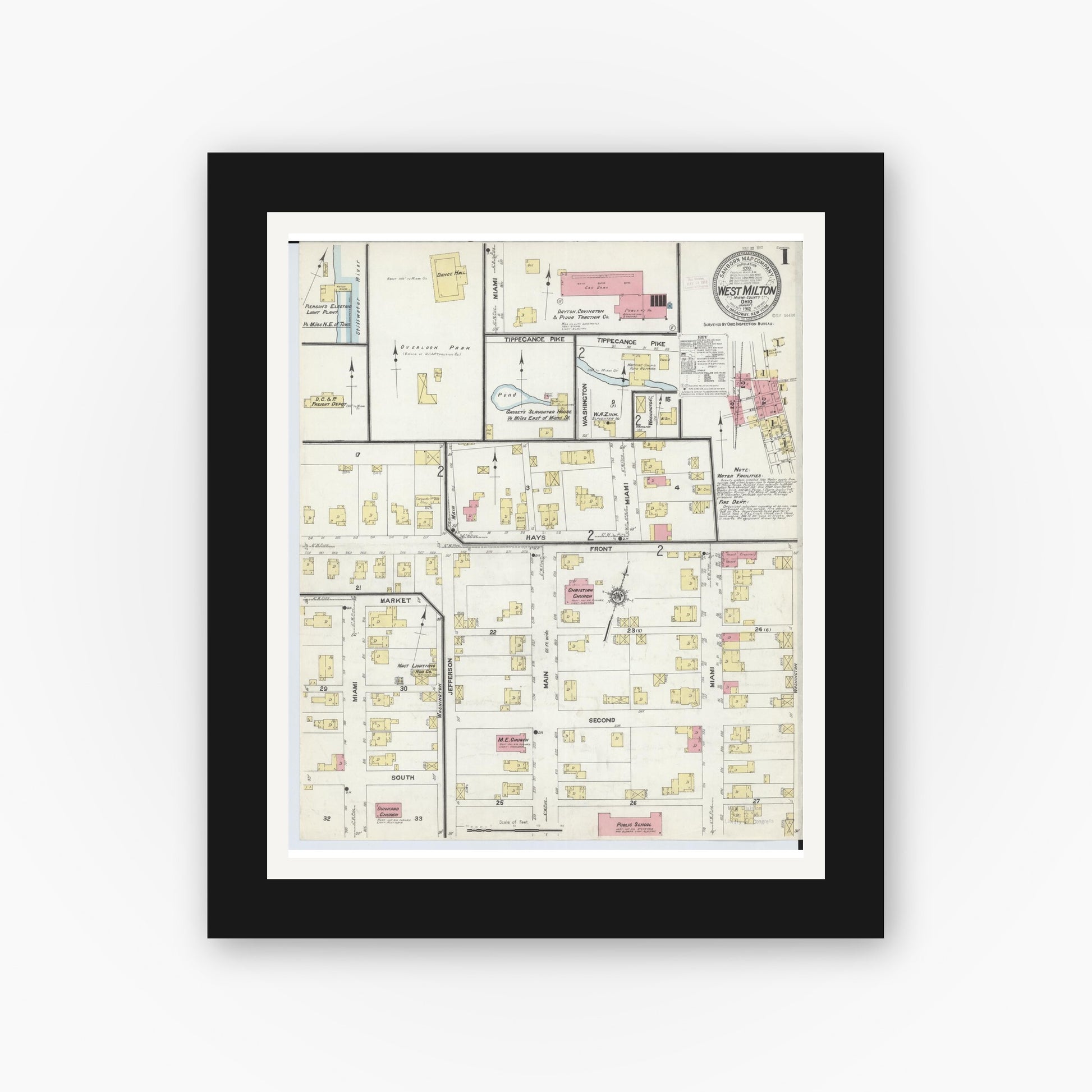 Old map wall art mockup — black gallery frame with white mat — Sanborn Fire Insurance Map from West Milton, Miami County, Ohio (1912), Sheet #0001
