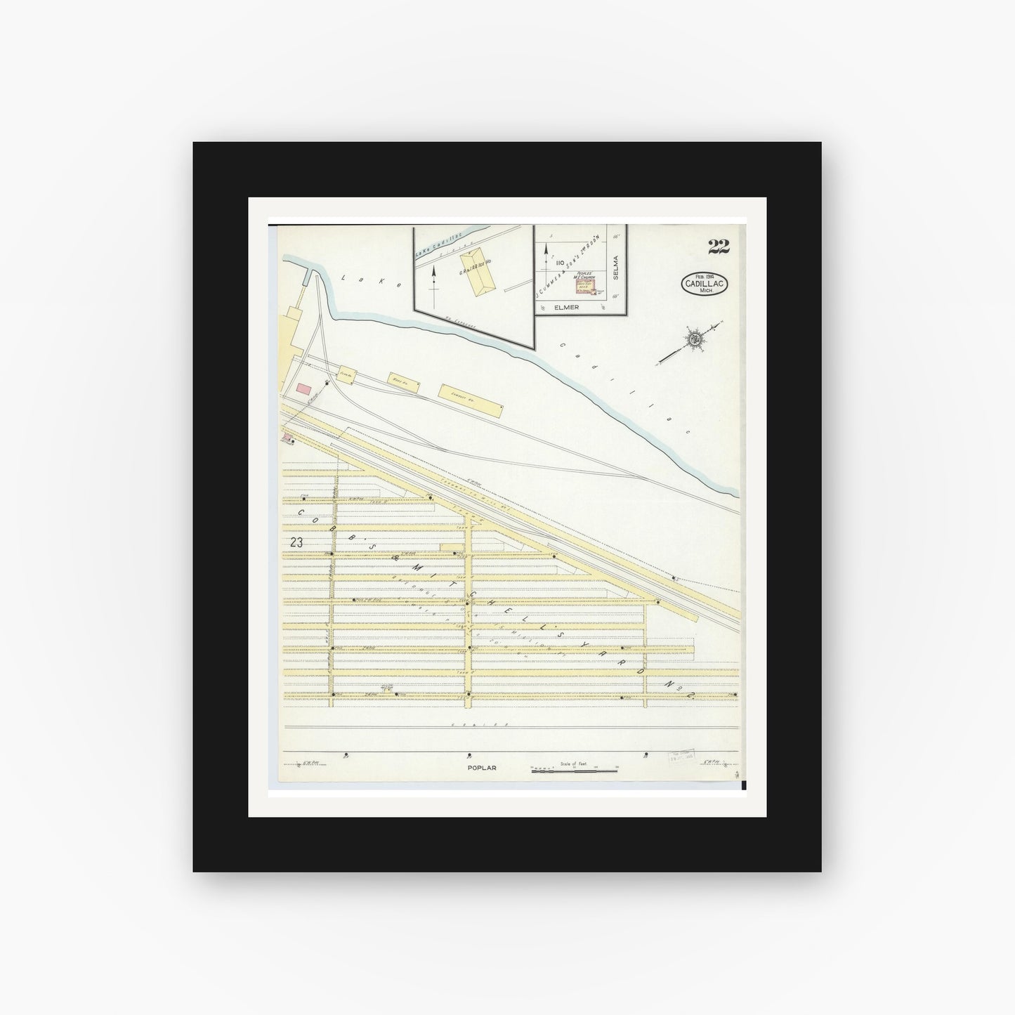 Old map wall art mockup — black gallery frame with white mat — Sanborn Fire Insurance Map from Cadillac, Wexford County, Michigan (1914), Sheet #0022