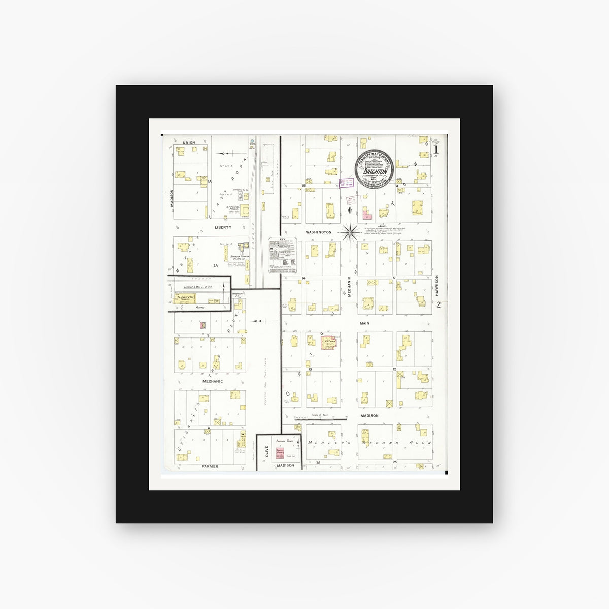 Old map wall art mockup — black gallery frame with white mat — Sanborn Fire Insurance Map from Brighton, Washington County, Iowa (1909), Sheet #0001