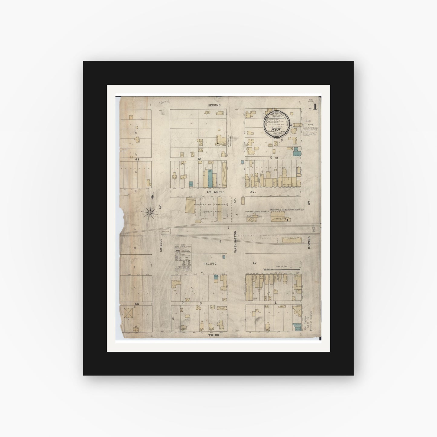 Old map wall art mockup — black gallery frame with white mat — Sanborn Fire Insurance Map from Ada, Norman County, Minnesota (1894), Sheet #0001