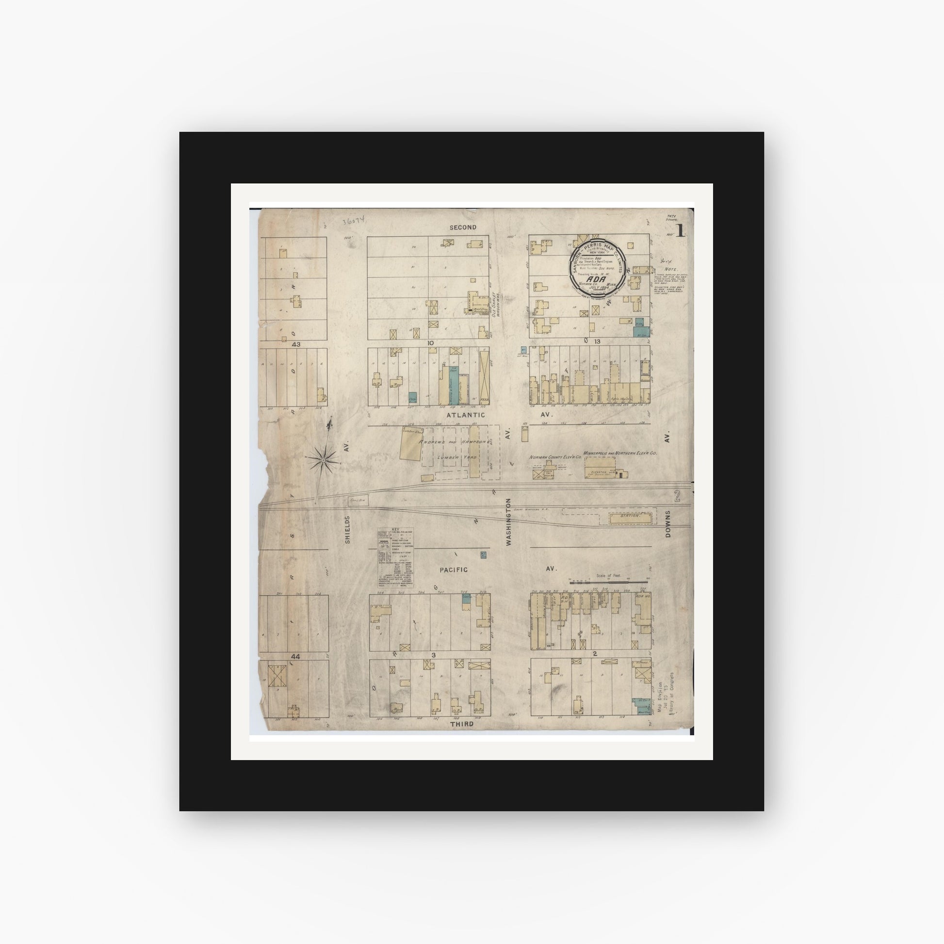 Old map wall art mockup — black gallery frame with white mat — Sanborn Fire Insurance Map from Ada, Norman County, Minnesota (1894), Sheet #0001