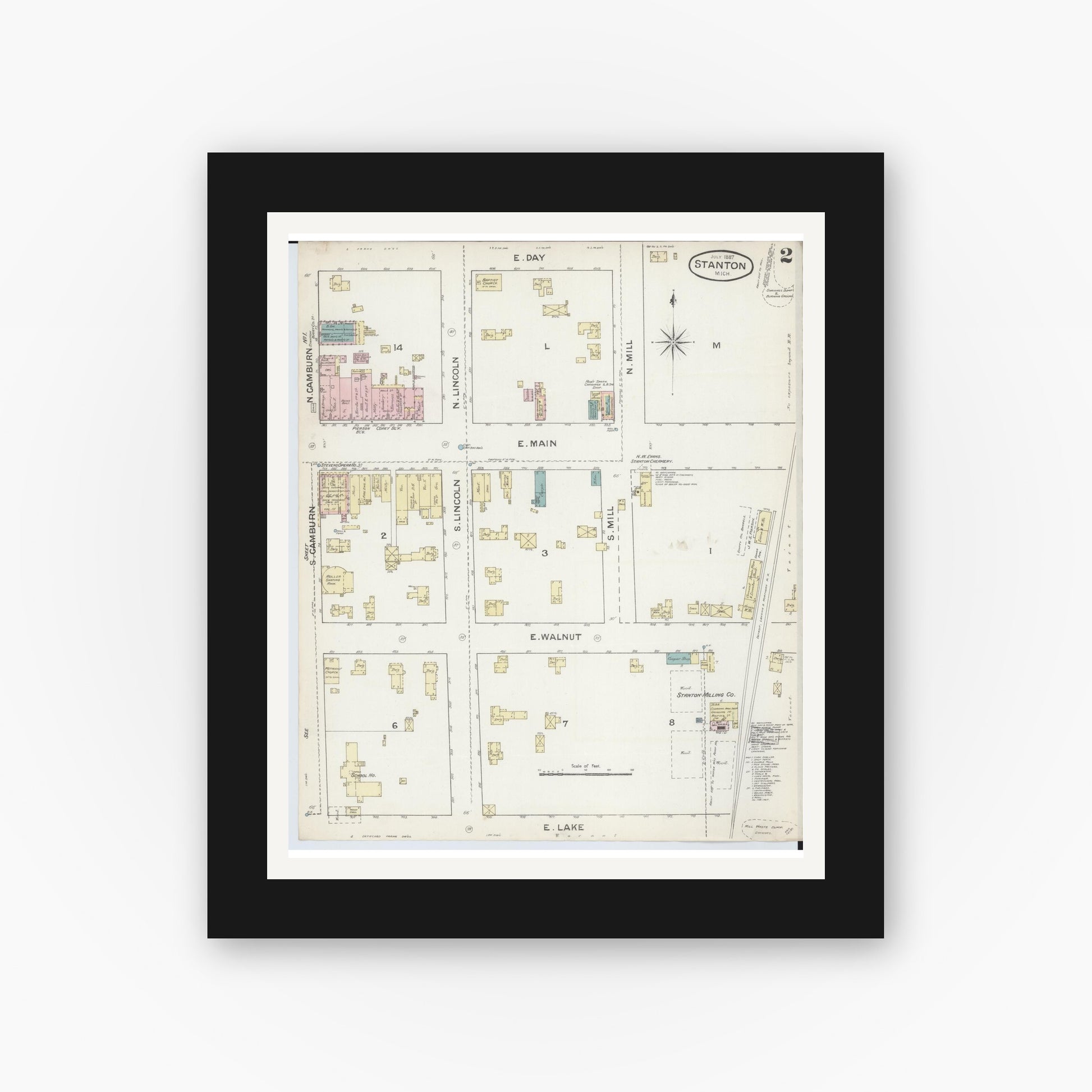 Old map wall art mockup — black gallery frame with white mat — Sanborn Fire Insurance Map from Stanton, Montcalm County, Michigan (1887), Sheet #0002
