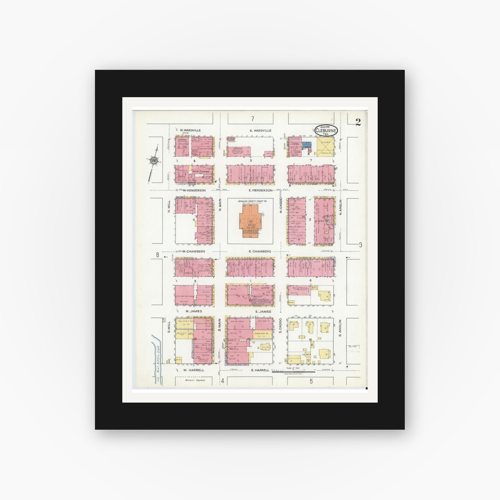 Old map wall art mockup — black gallery frame with white mat — Sanborn Fire Insurance Map from Cleburne, Johnson County, Texas (1918), Sheet #0002