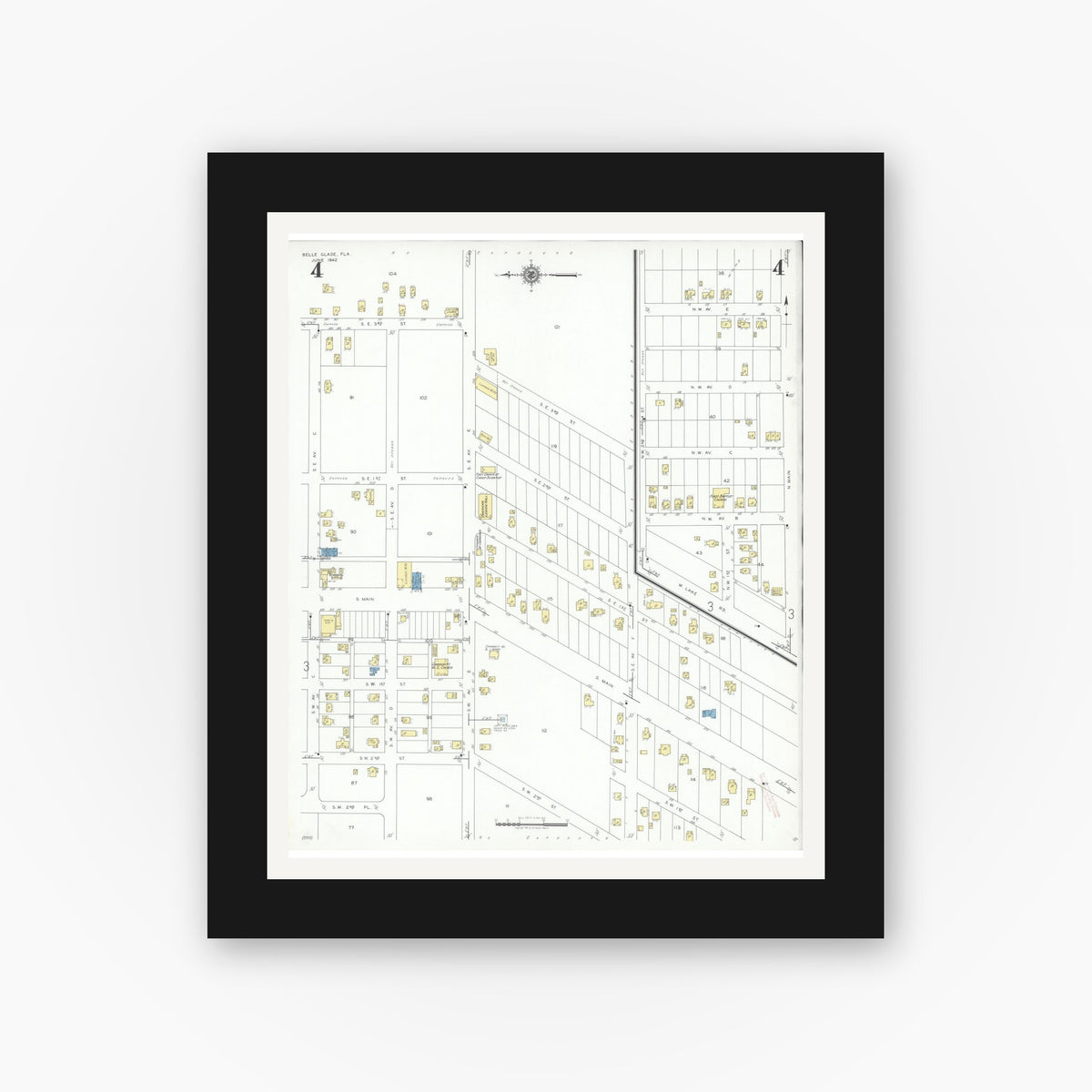 Old map wall art mockup — black gallery frame with white mat — Sanborn Fire Insurance Map from Belle Glade, Palm Beach County, Florida (1942), Sheet #0004