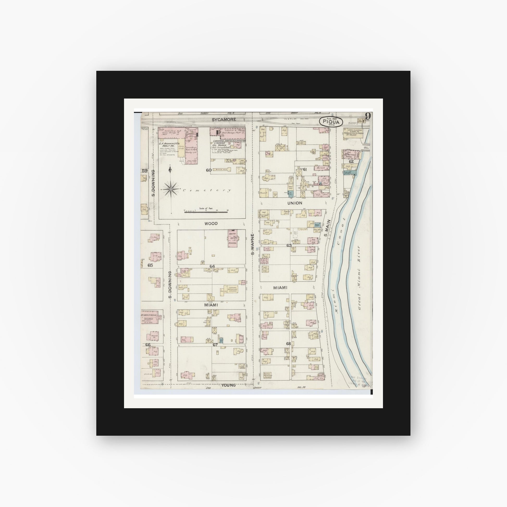 Old map wall art mockup — black gallery frame with white mat — Sanborn Fire Insurance Map from Piqua, Miami County, Ohio (1887), Sheet #0009